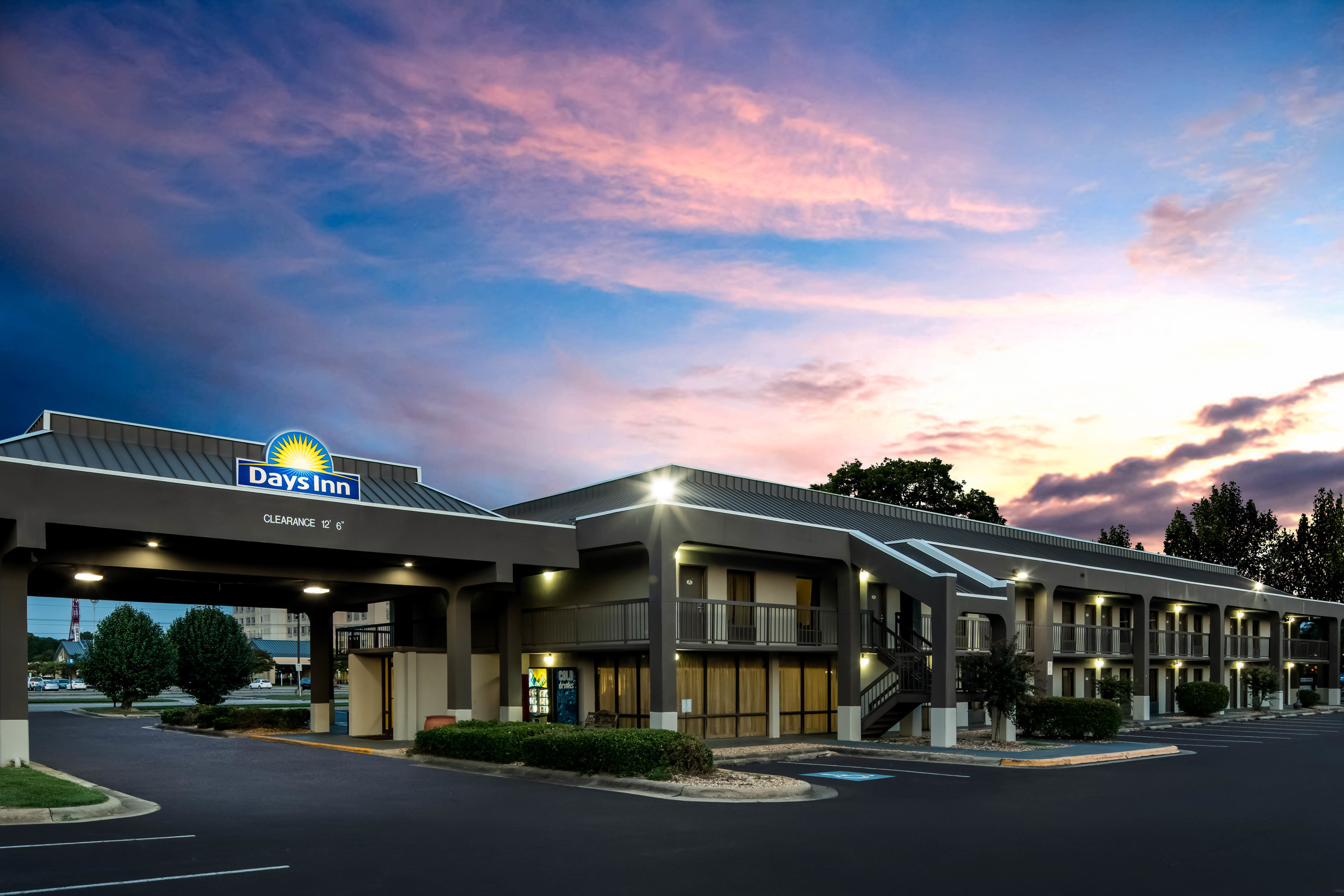 Exterior Dusk Image of Days Inn by Wyndham, Wilson hotel in Wilson, North Carolina