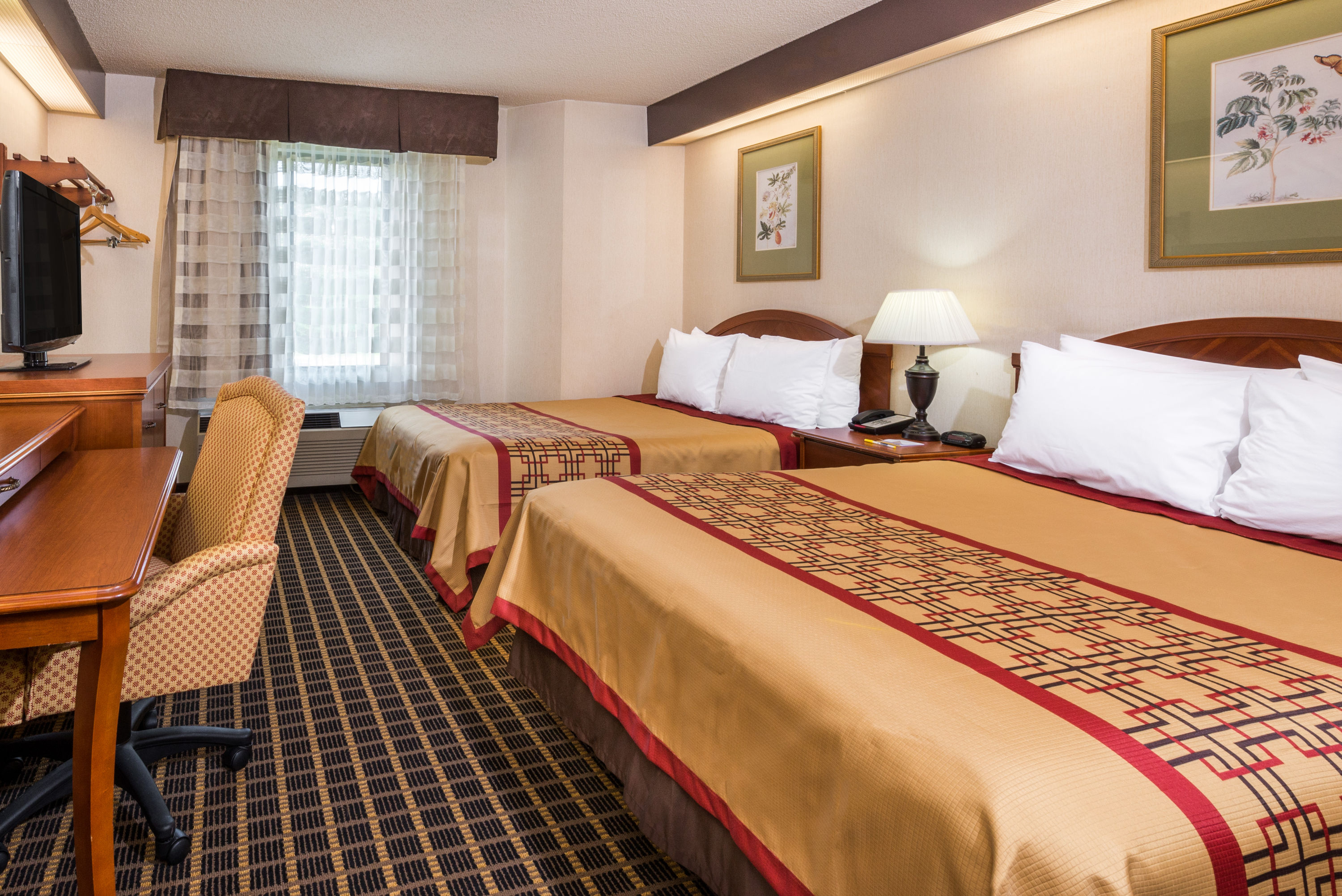 Guest room at the Days Inn by Wyndham Yadkinville in Yadkinville, North Carolina