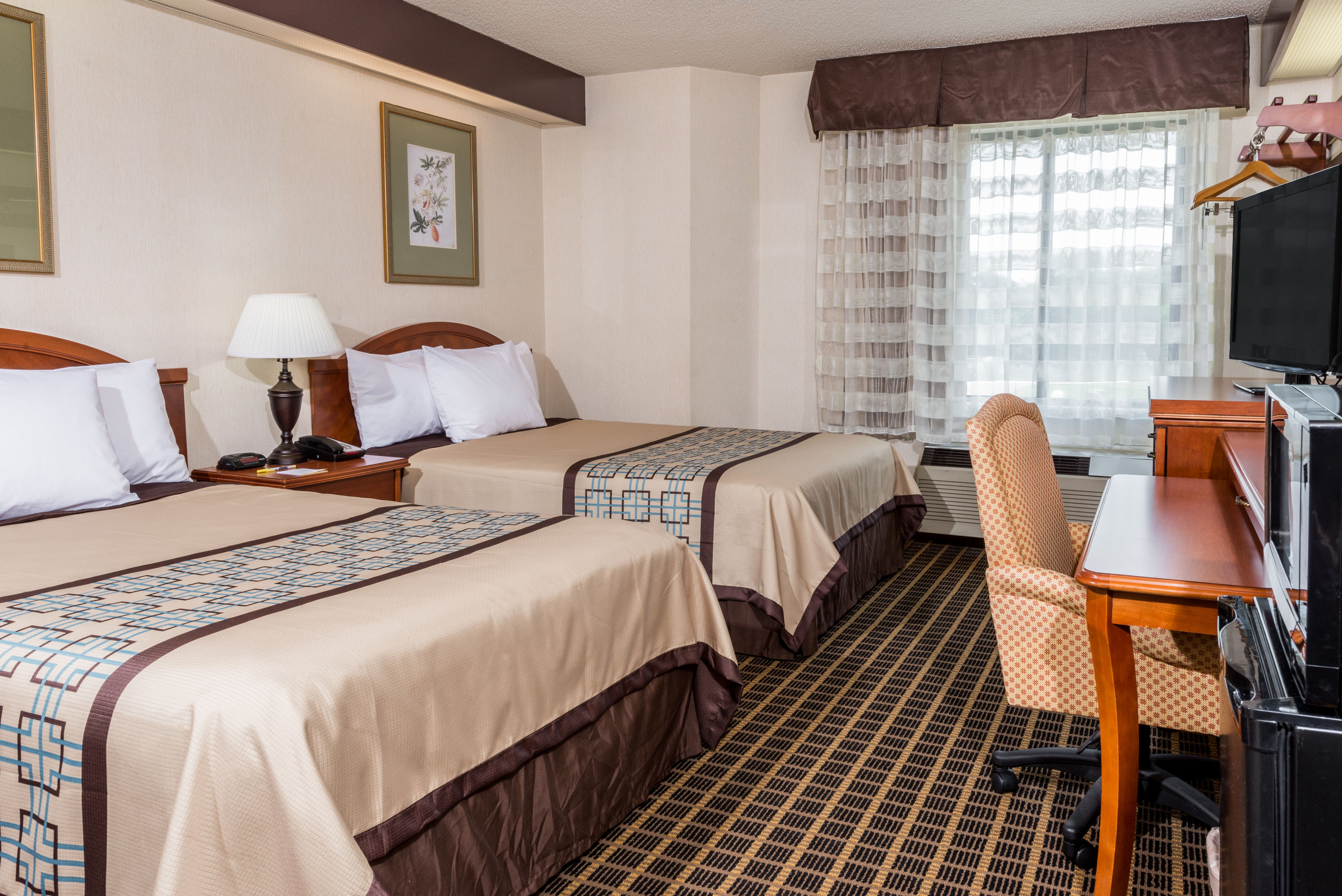 Guest room at the Days Inn by Wyndham Yadkinville in Yadkinville, North Carolina