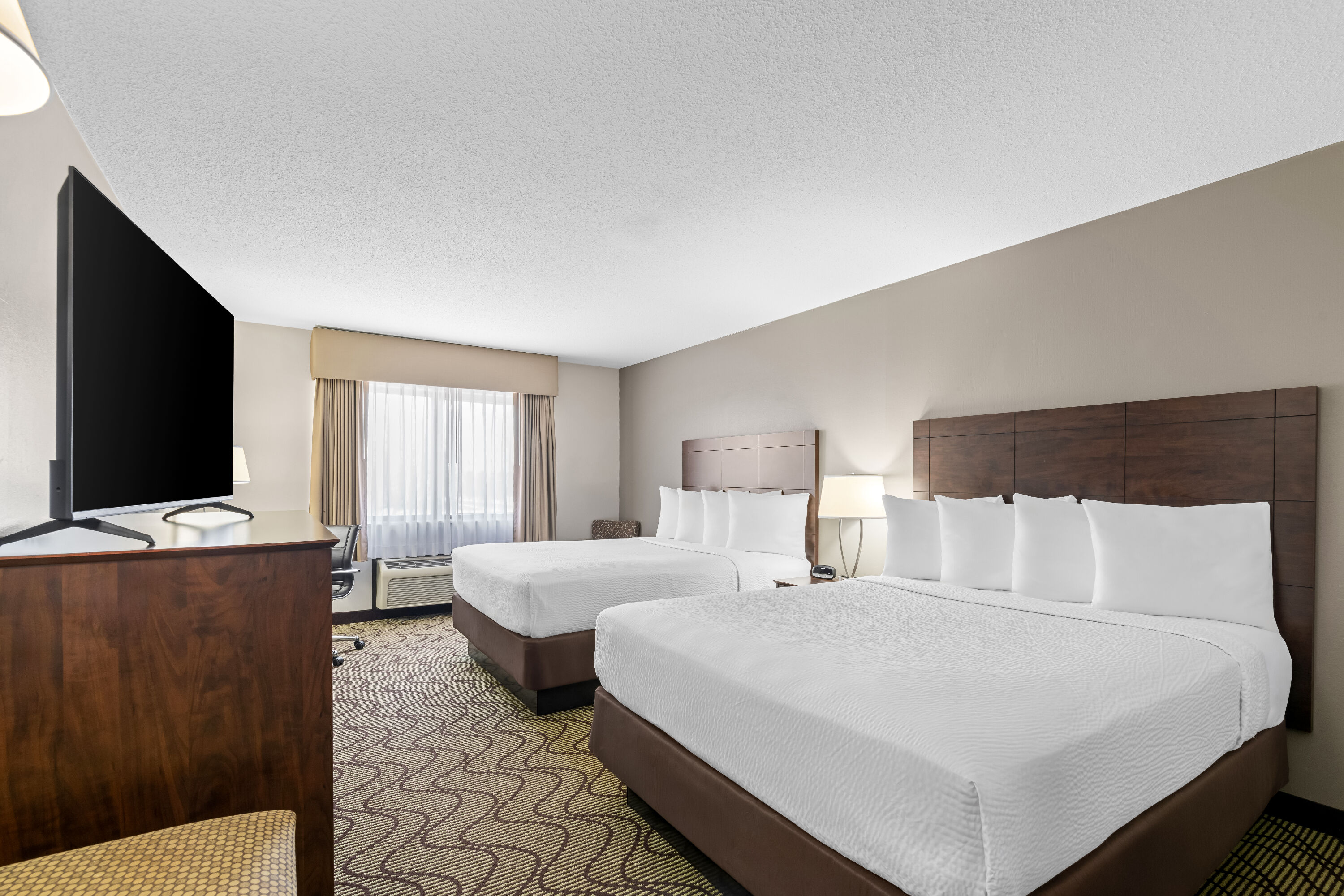 Double bed guest room at the Days Inn by Wyndham Grand Forks Columbia Mall in Grand Forks, North Dakota