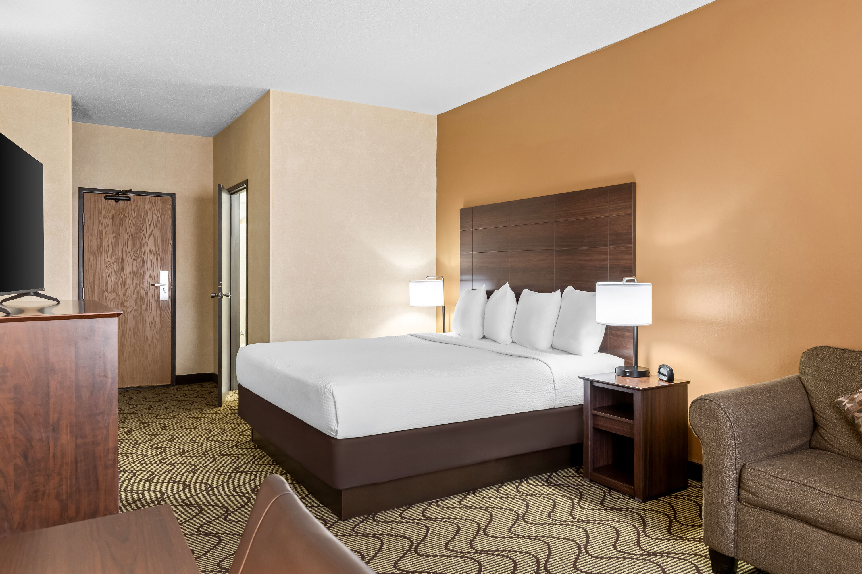 King bed guest room at the Days Inn by Wyndham Grand Forks Columbia Mall in Grand Forks, North Dakota