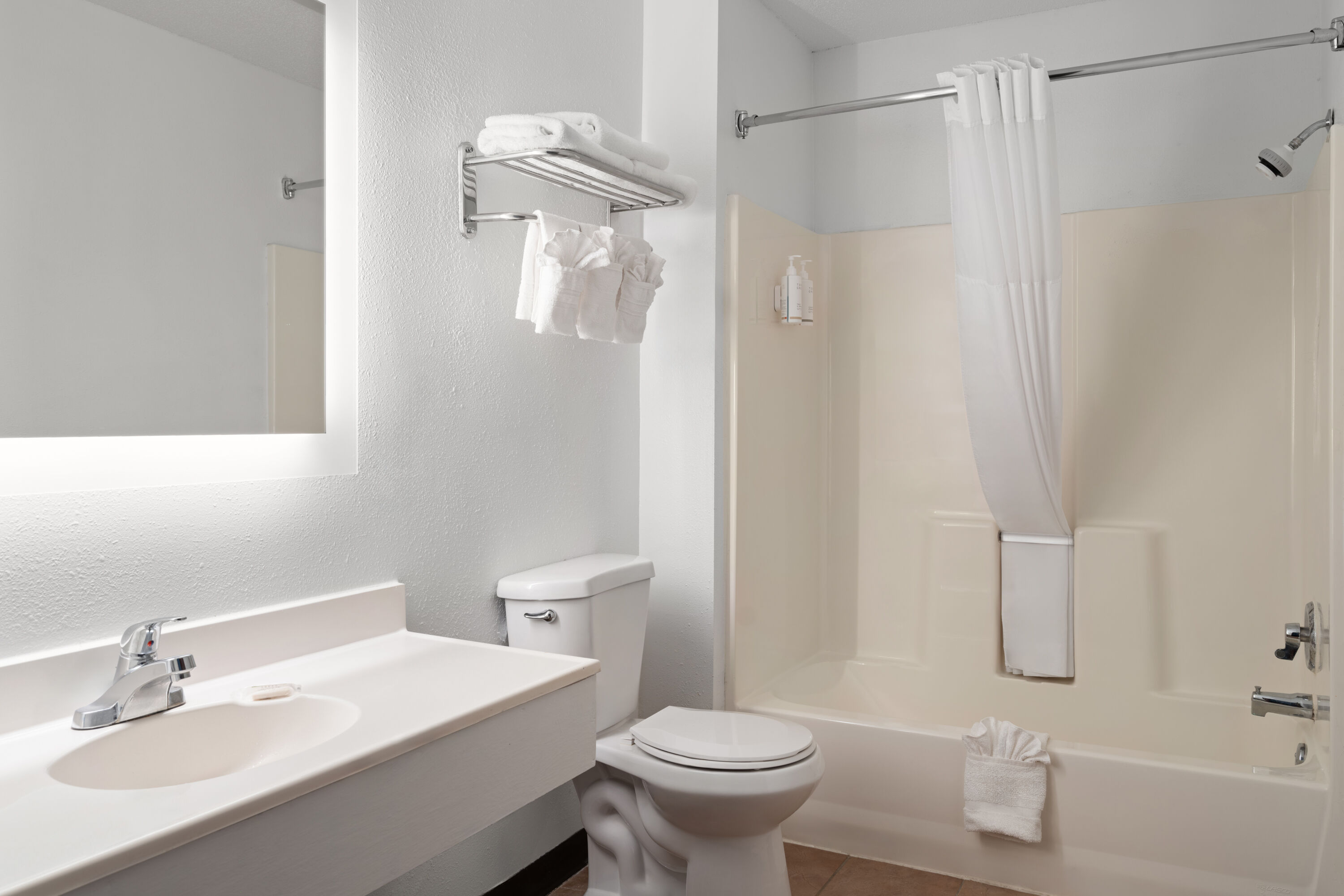 Guest room bath at the Days Inn by Wyndham Jamestown in Jamestown, North Dakota