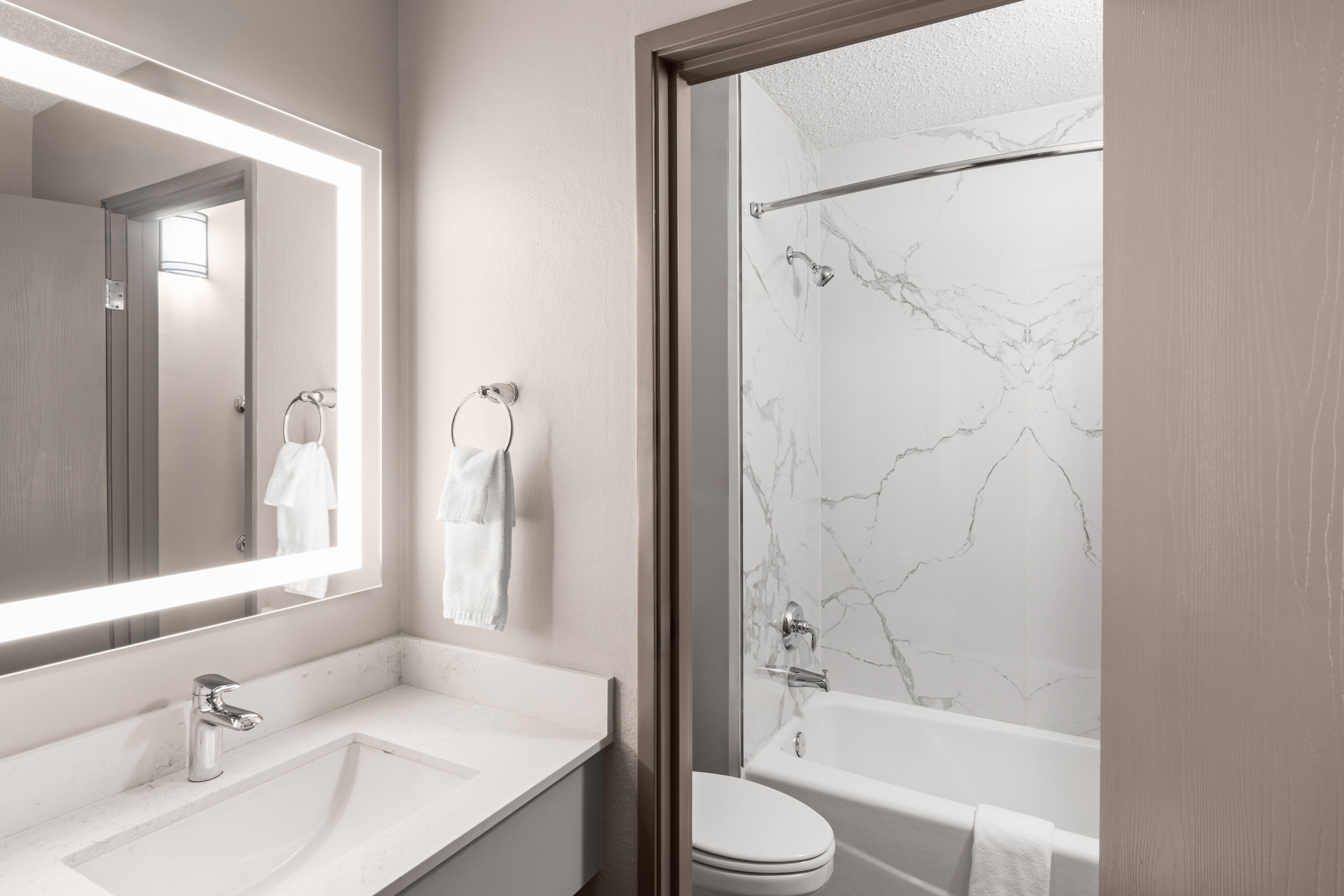 Guest room bath at the Days Inn by Wyndham Mandan Bismarck Area in Mandan, North Dakota