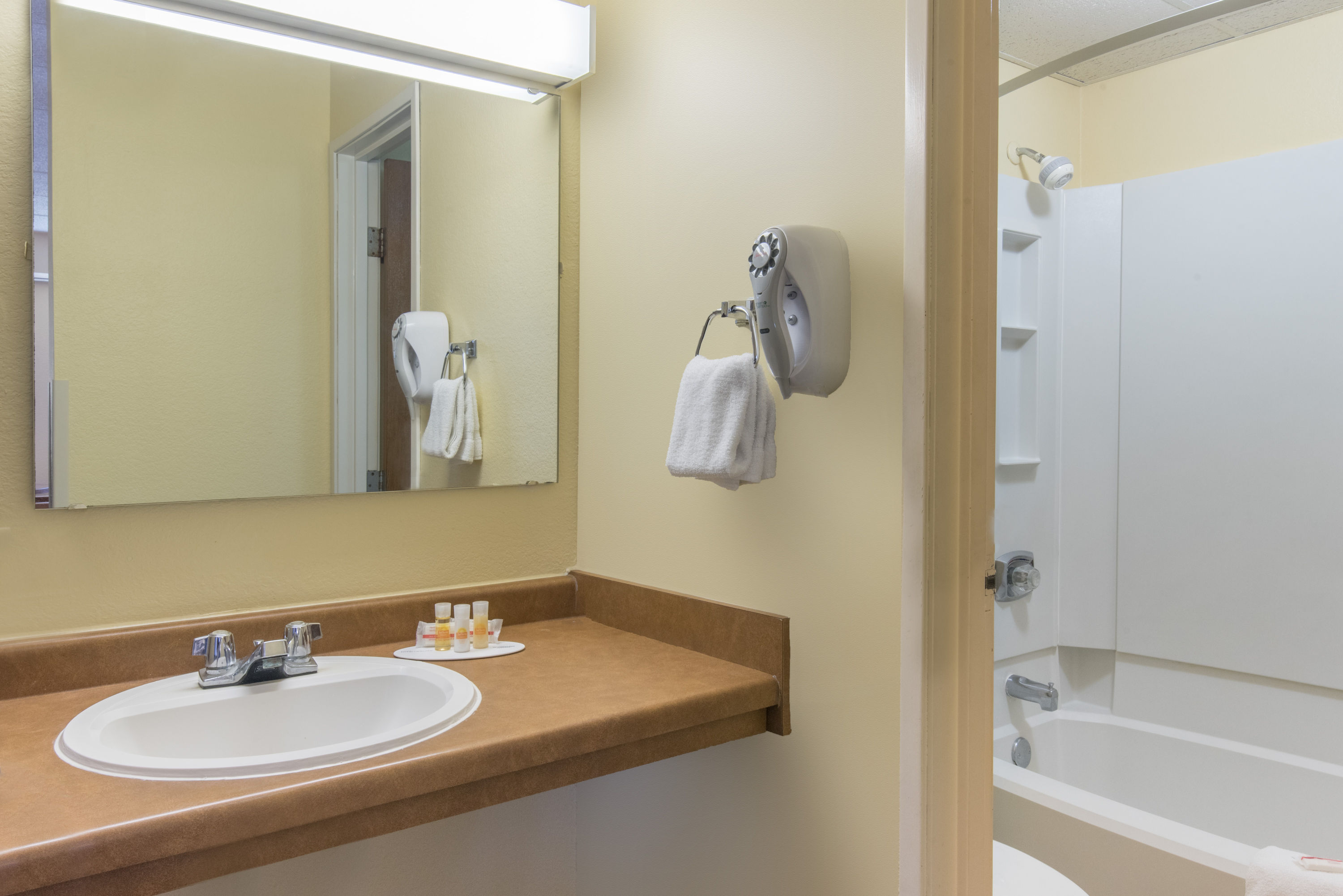 Guest room bath at the Days Inn by Wyndham Minot in Minot, North Dakota