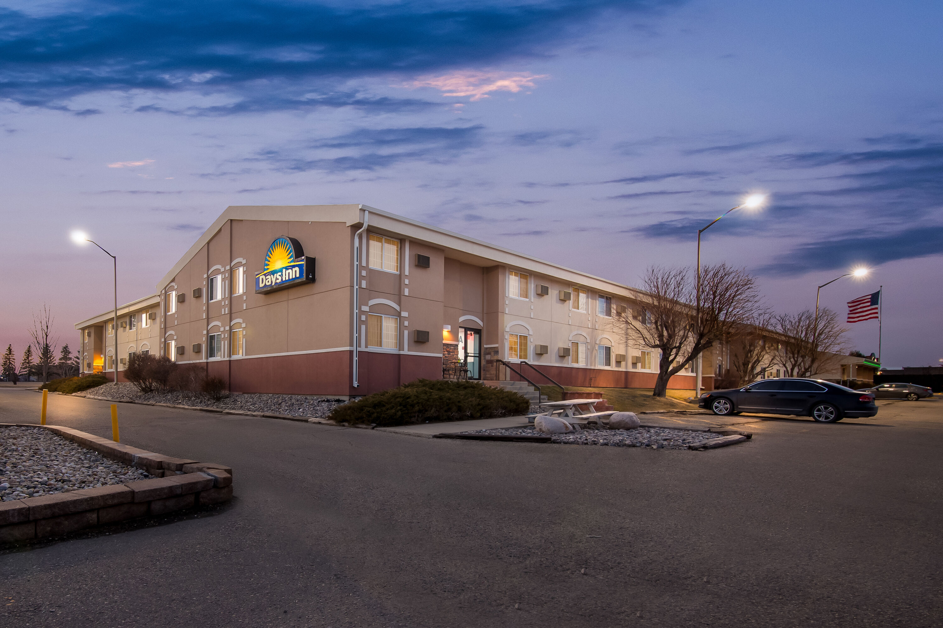 Exterior Night Image of Days Inn by Wyndham Minot hotel in Minot, North Dakota