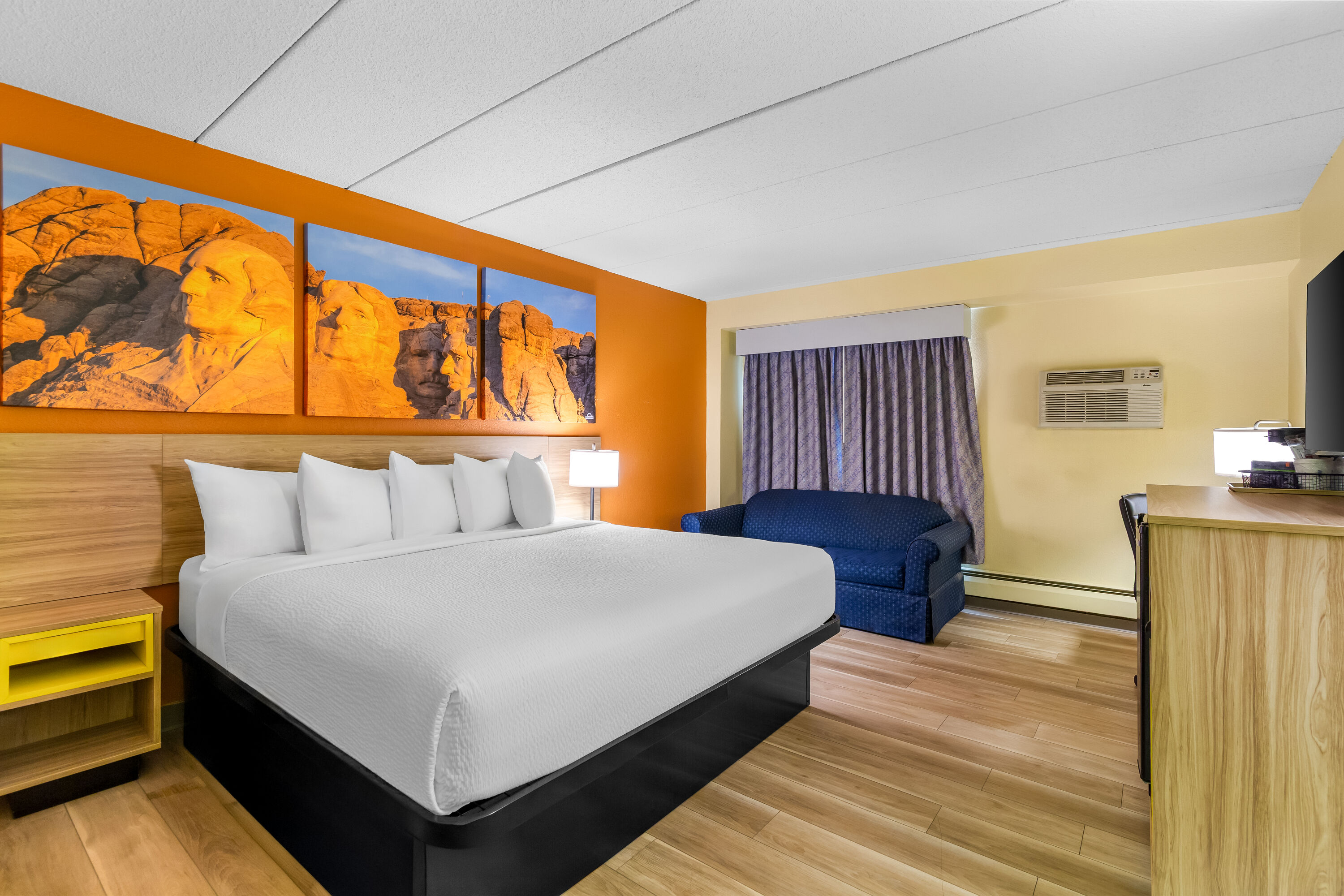 King bed guest room at the Days Inn by Wyndham Minot in Minot, North Dakota