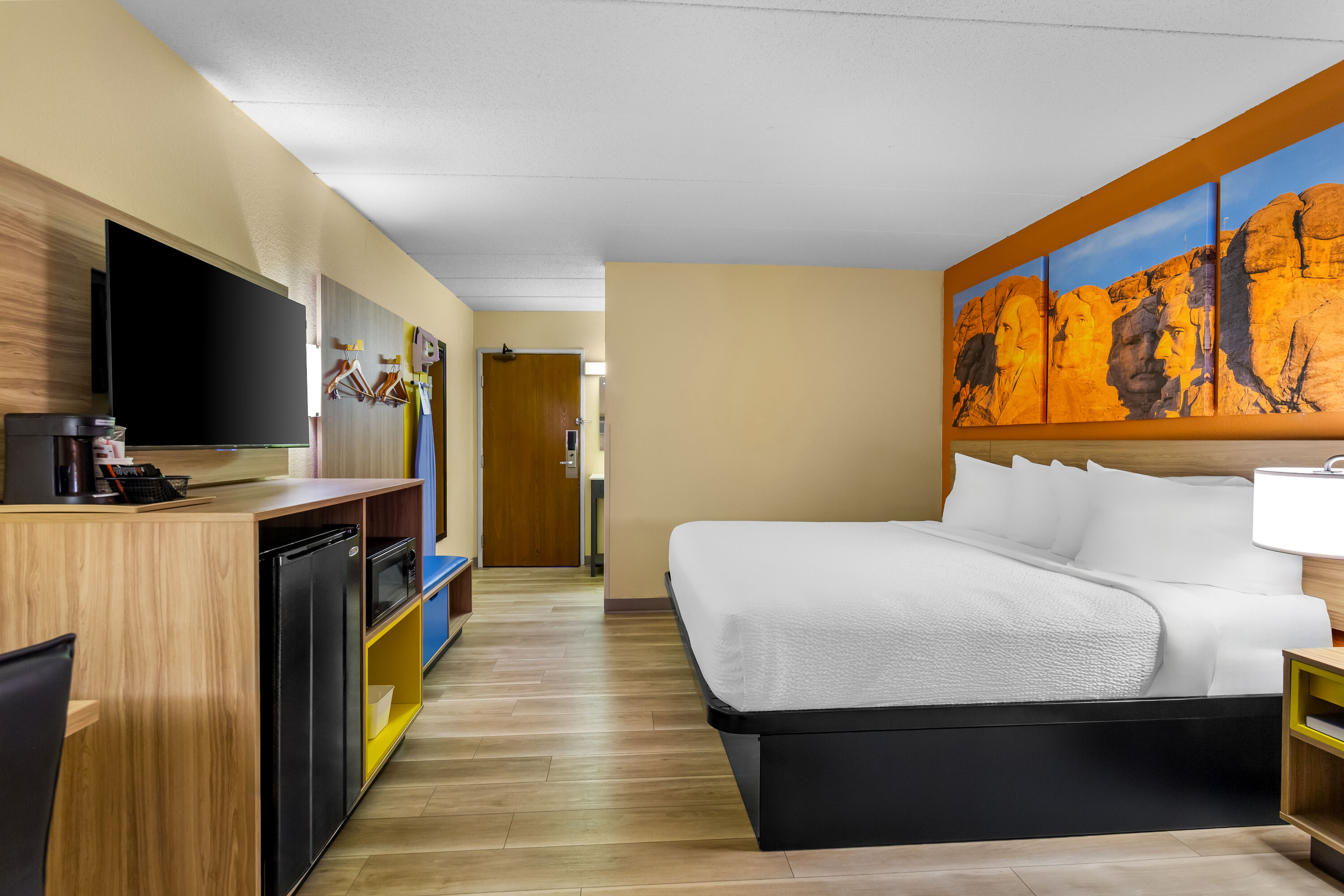 King bed guest room at the Days Inn by Wyndham Minot in Minot, North Dakota