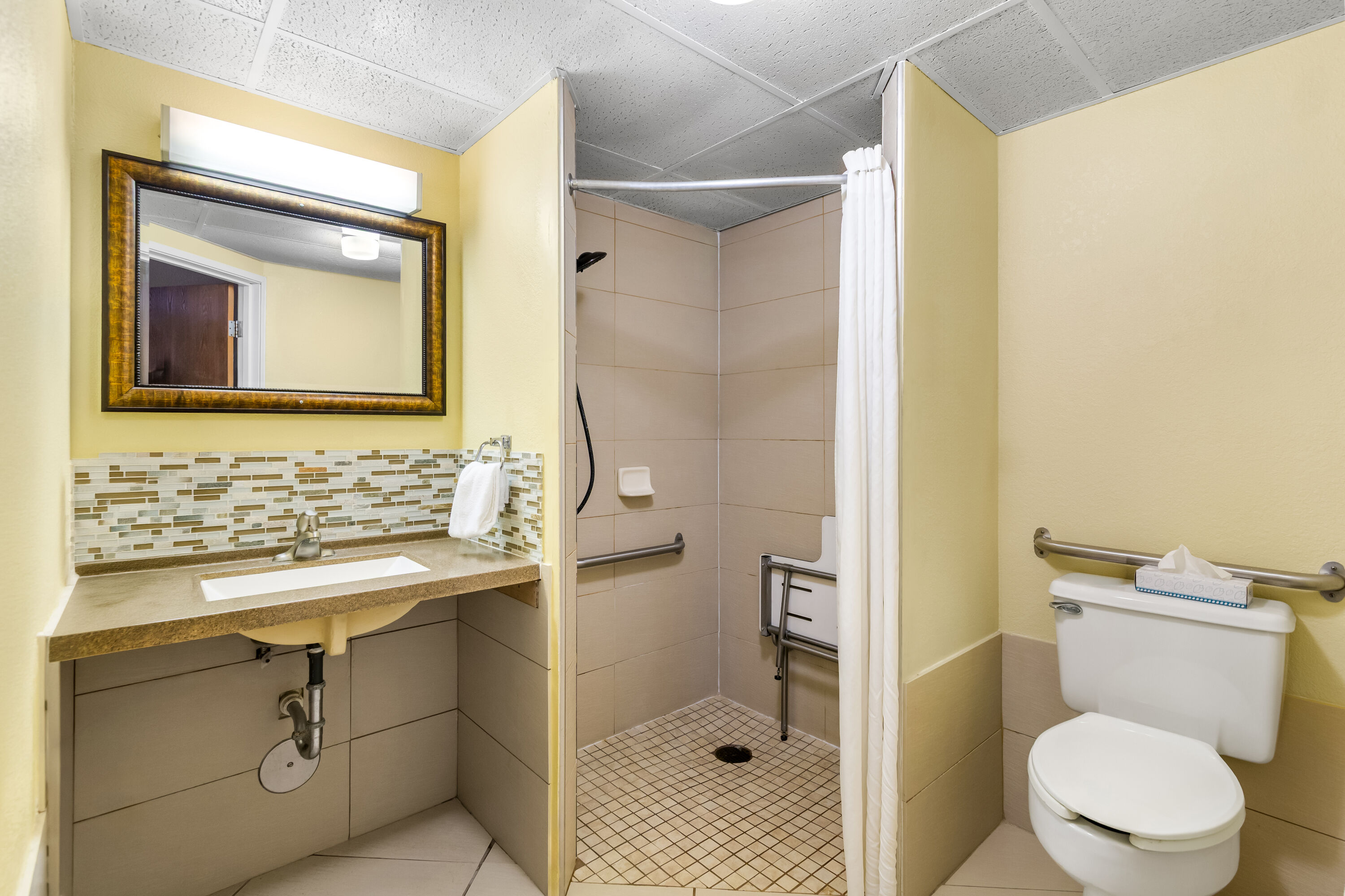 Guest room bath at the Days Inn by Wyndham Minot in Minot, North Dakota