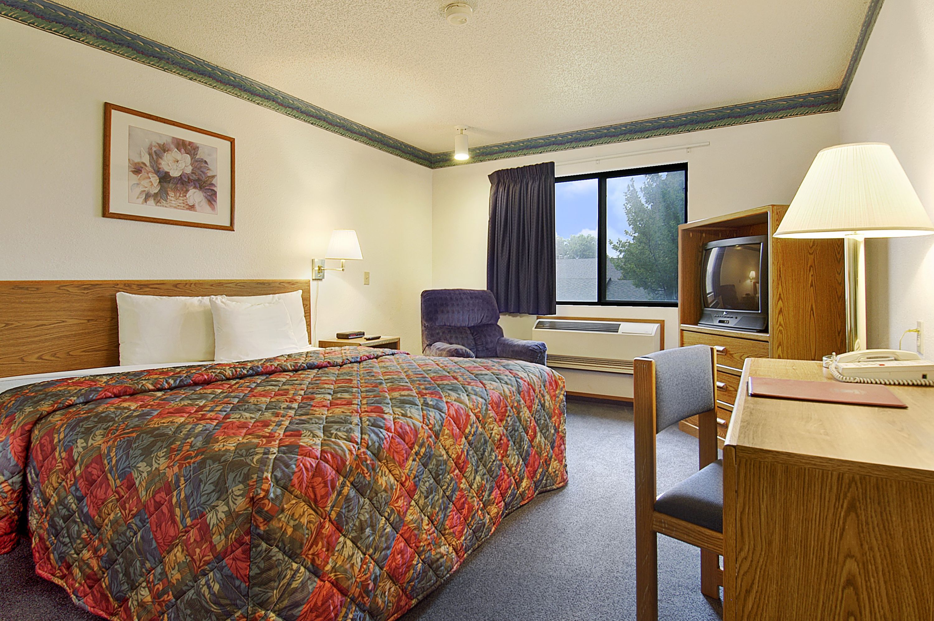 Guest room at the Days Inn by Wyndham Omaha/West Dodge in Omaha, Nebraska