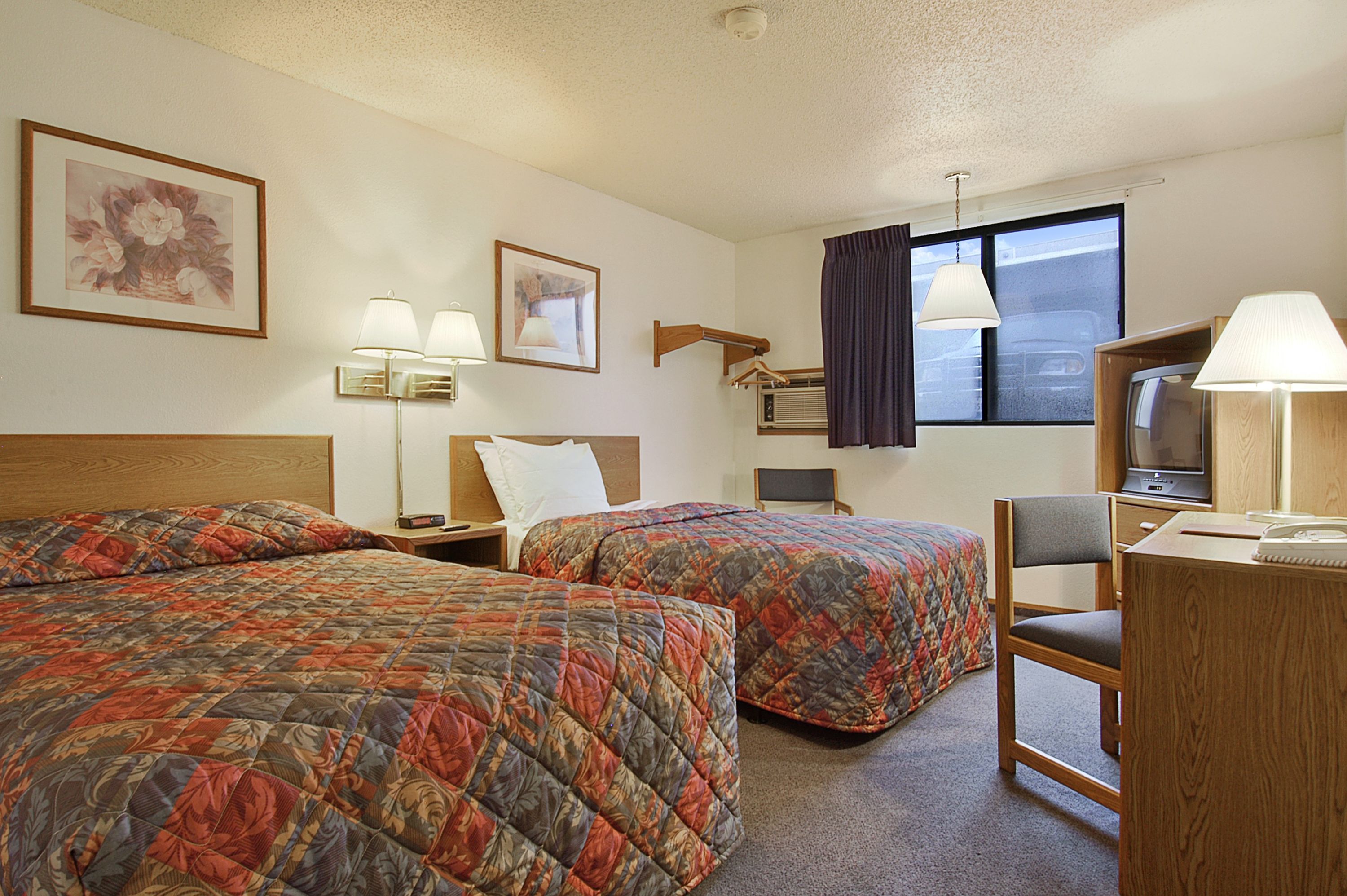 Guest room at the Days Inn by Wyndham Omaha/West Dodge in Omaha, Nebraska