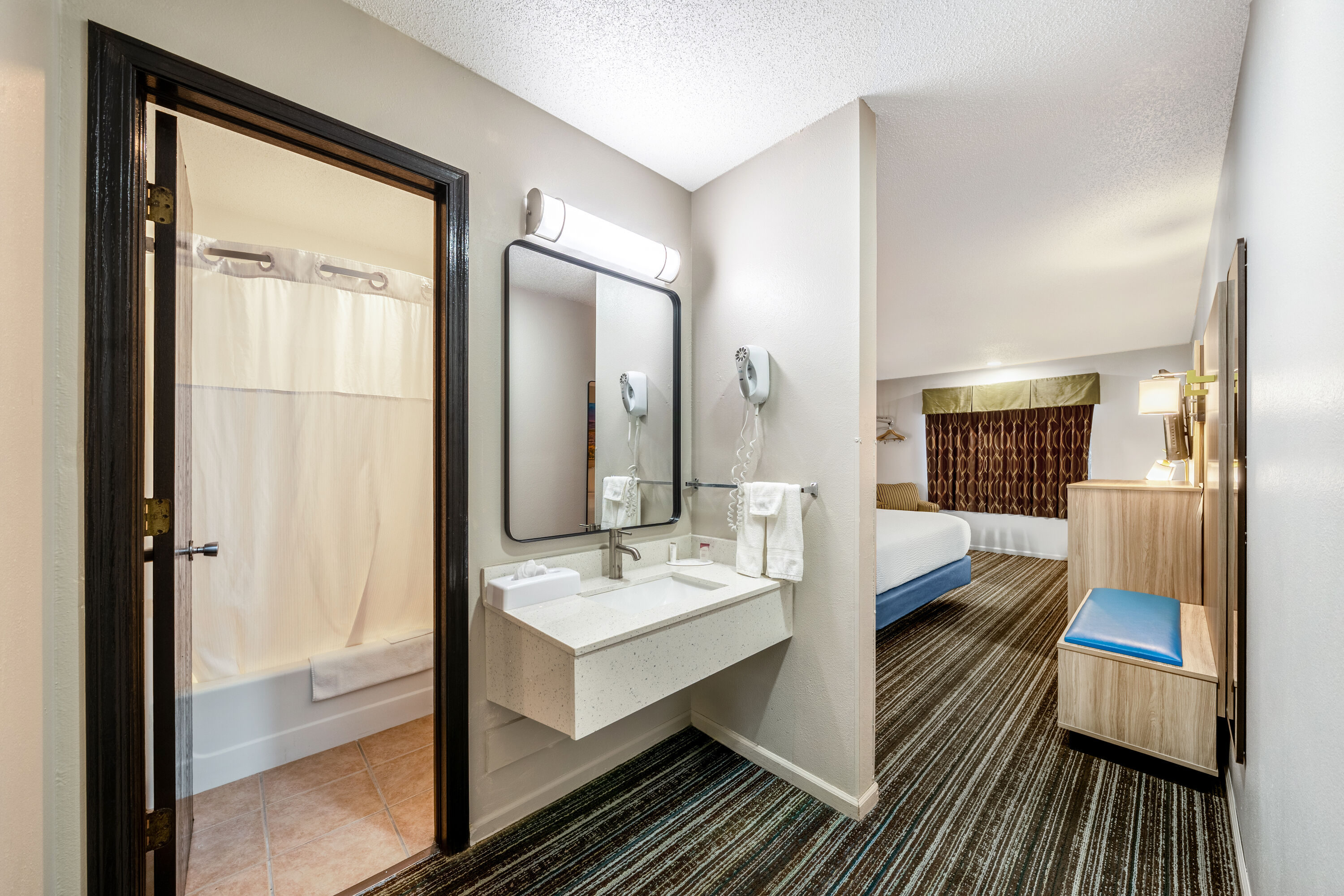 King bed guest room at the Days Inn by Wyndham York in York, Nebraska