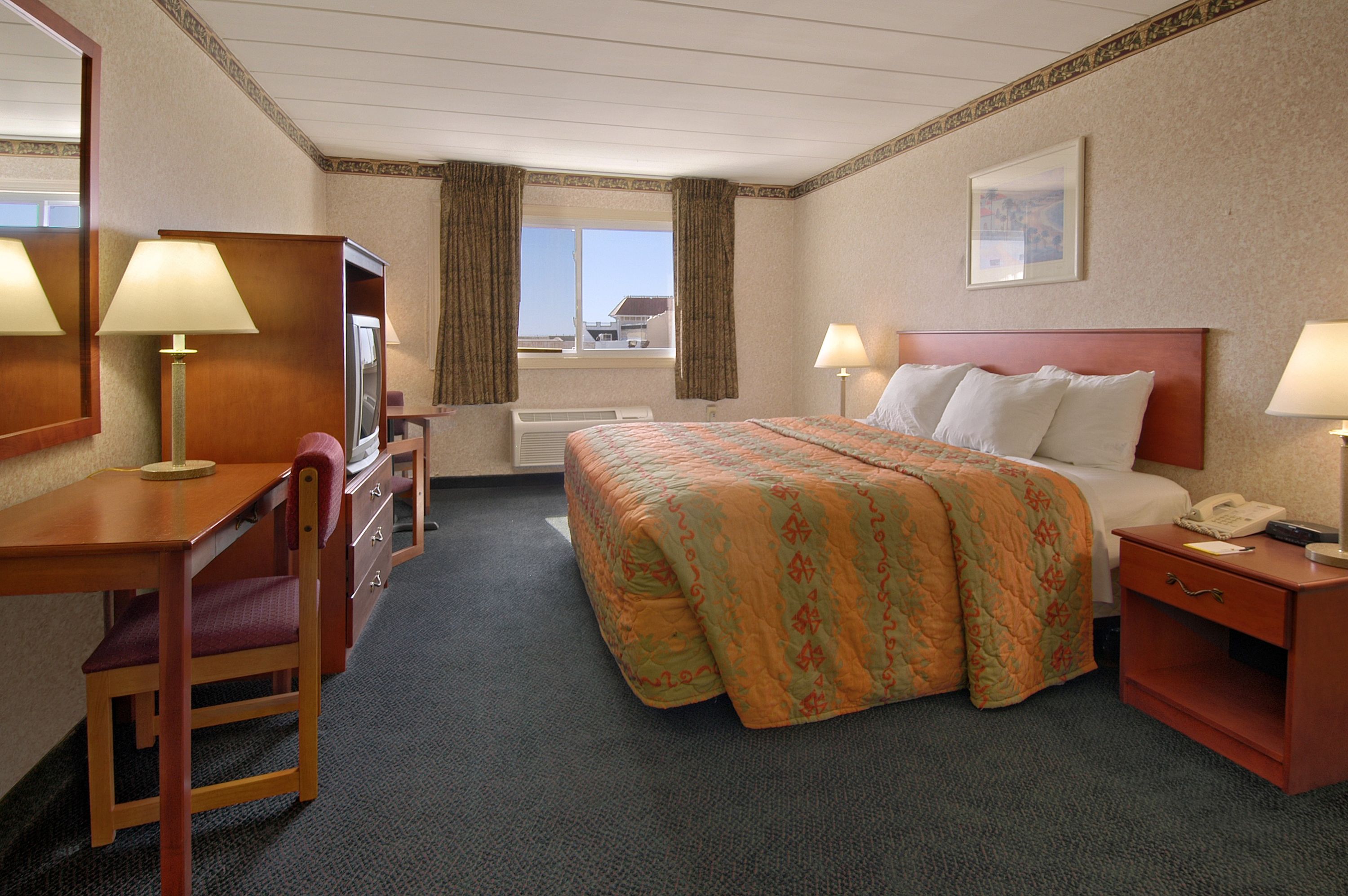 Guest room at the Days Inn by Wyndham Atlantic City Beachblock in Atlantic City, New Jersey