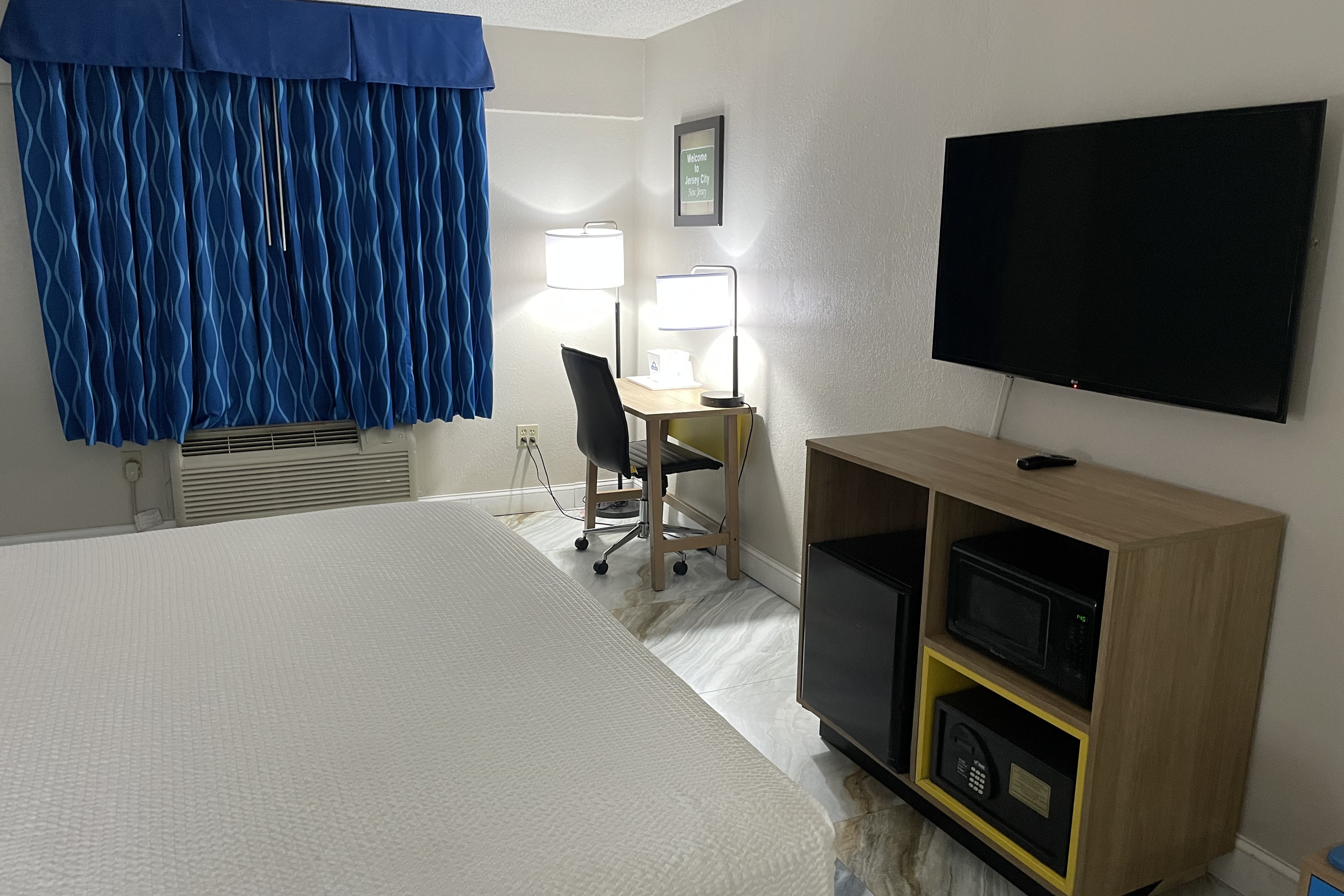 Guest room at the Days Inn by Wyndham Jersey City / NYC Area in Jersey City, New Jersey
