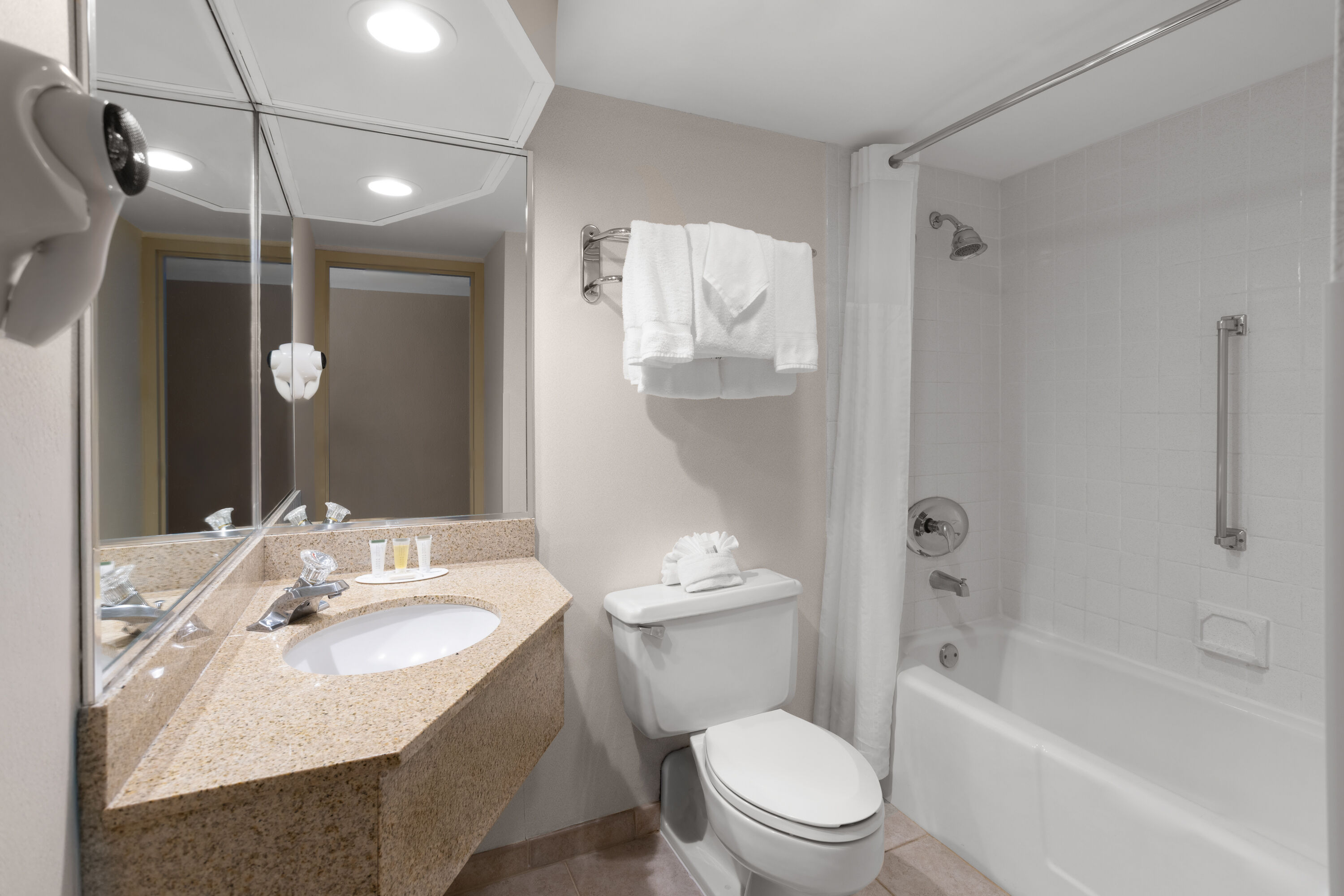 Guest room bath at the Days Hotel by Wyndham Toms River Jersey Shore in Toms River, New Jersey