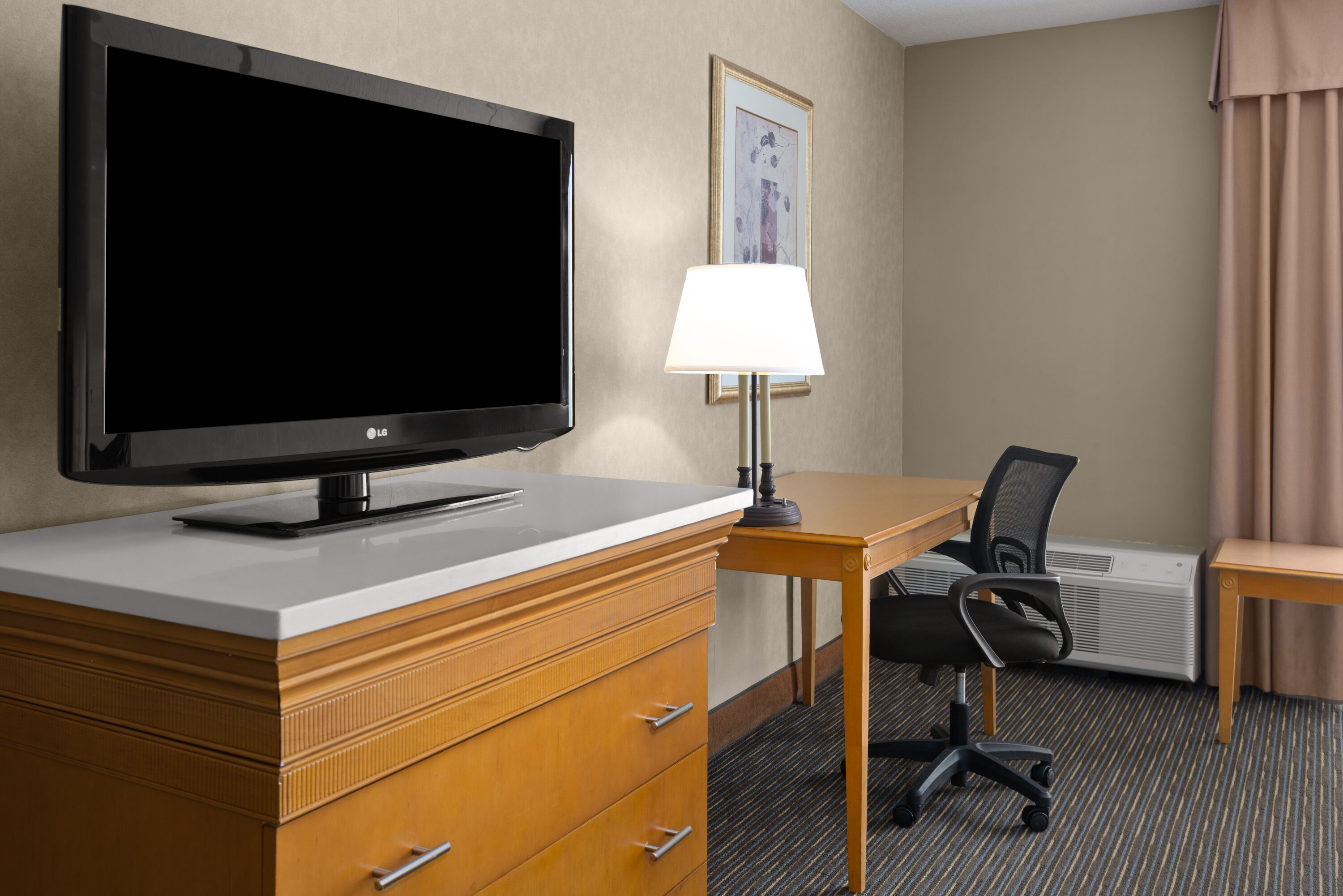 Guest room at the Days Hotel by Wyndham Toms River Jersey Shore in Toms River, New Jersey