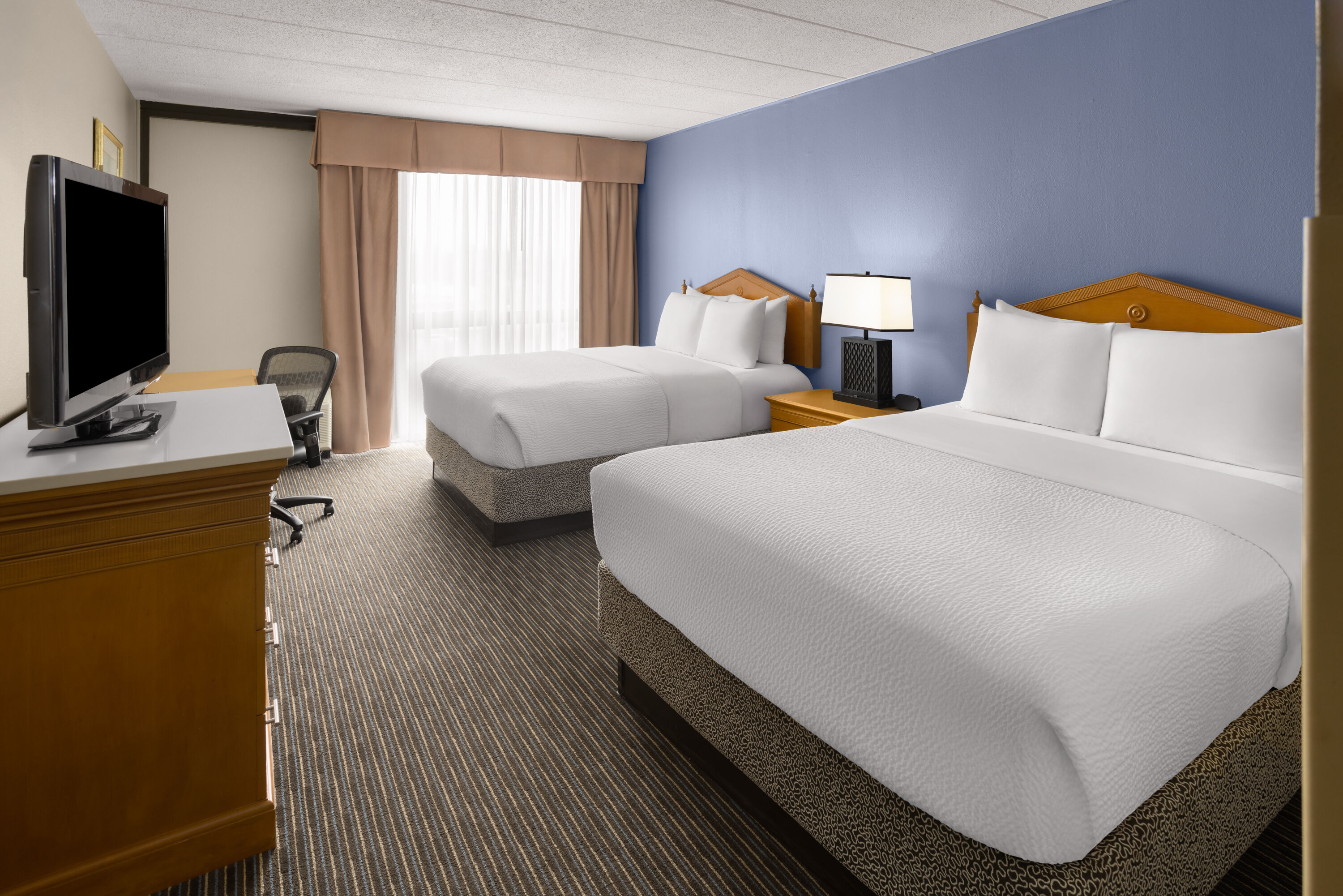 Guest room at the Days Hotel by Wyndham Toms River Jersey Shore in Toms River, New Jersey