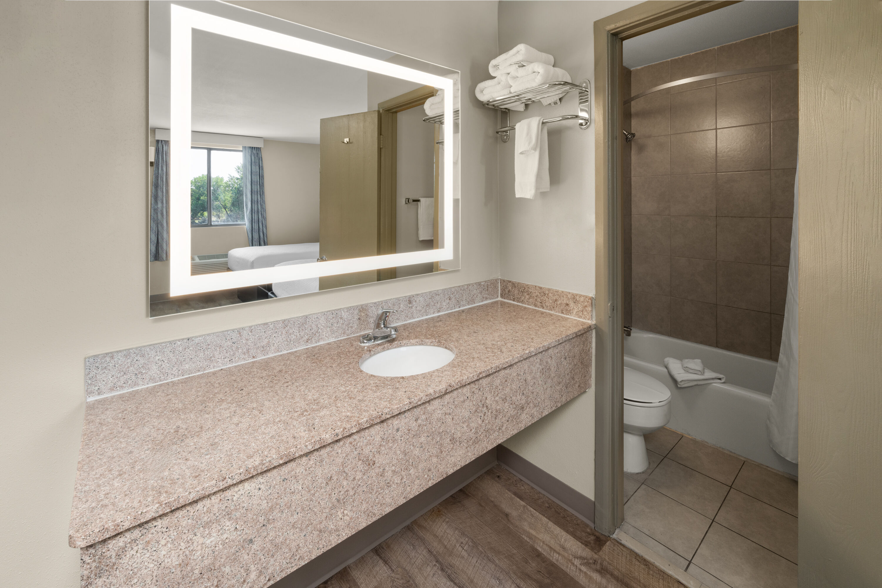 Guest room bath at the Days Inn by Wyndham Farmington NM in Farmington, New Mexico