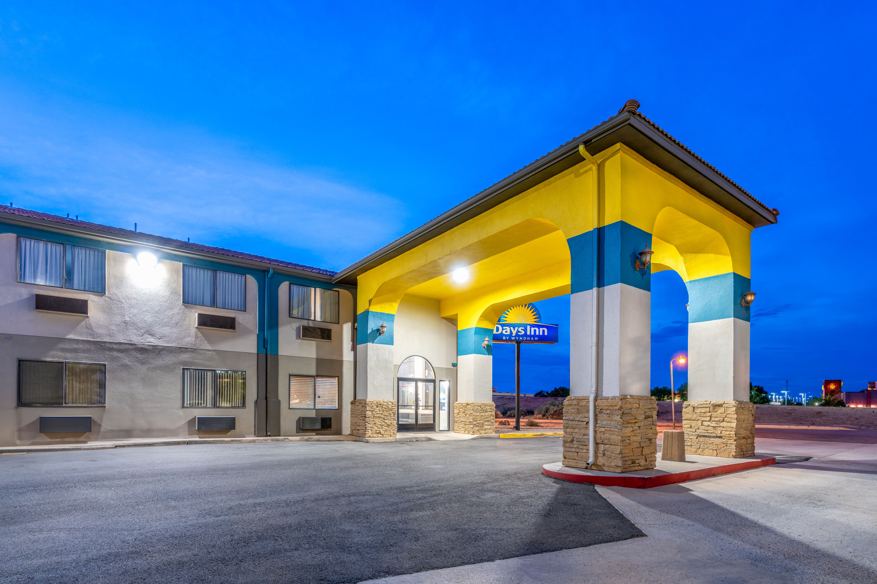 Exterior Dusk Image of Days Inn by Wyndham Los Lunas hotel in Los Lunas, New Mexico