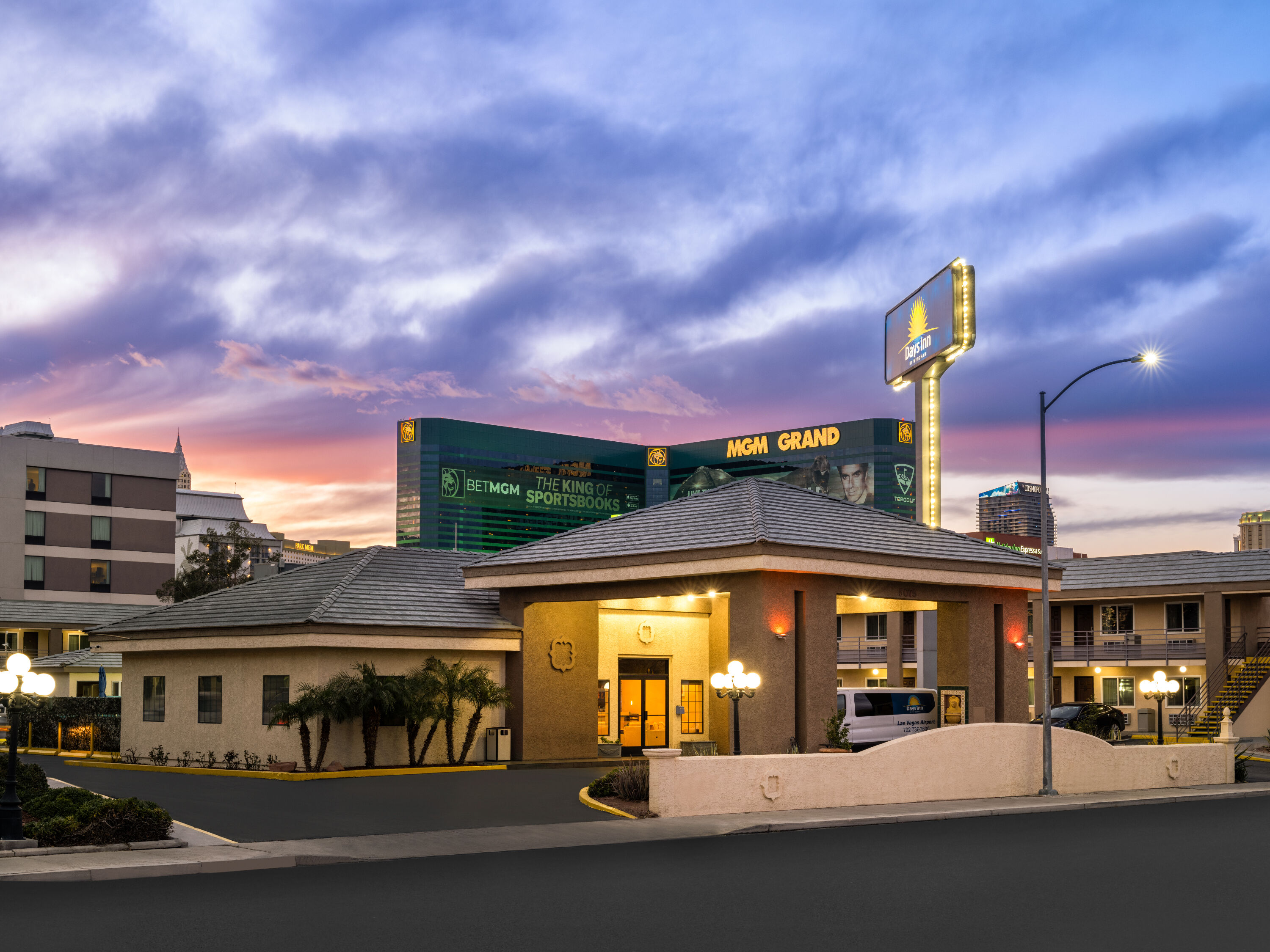 Exterior Dusk Image of Days Inn by Wyndham Las Vegas Airport Near the Strip hotel in Las Vegas, Nevada