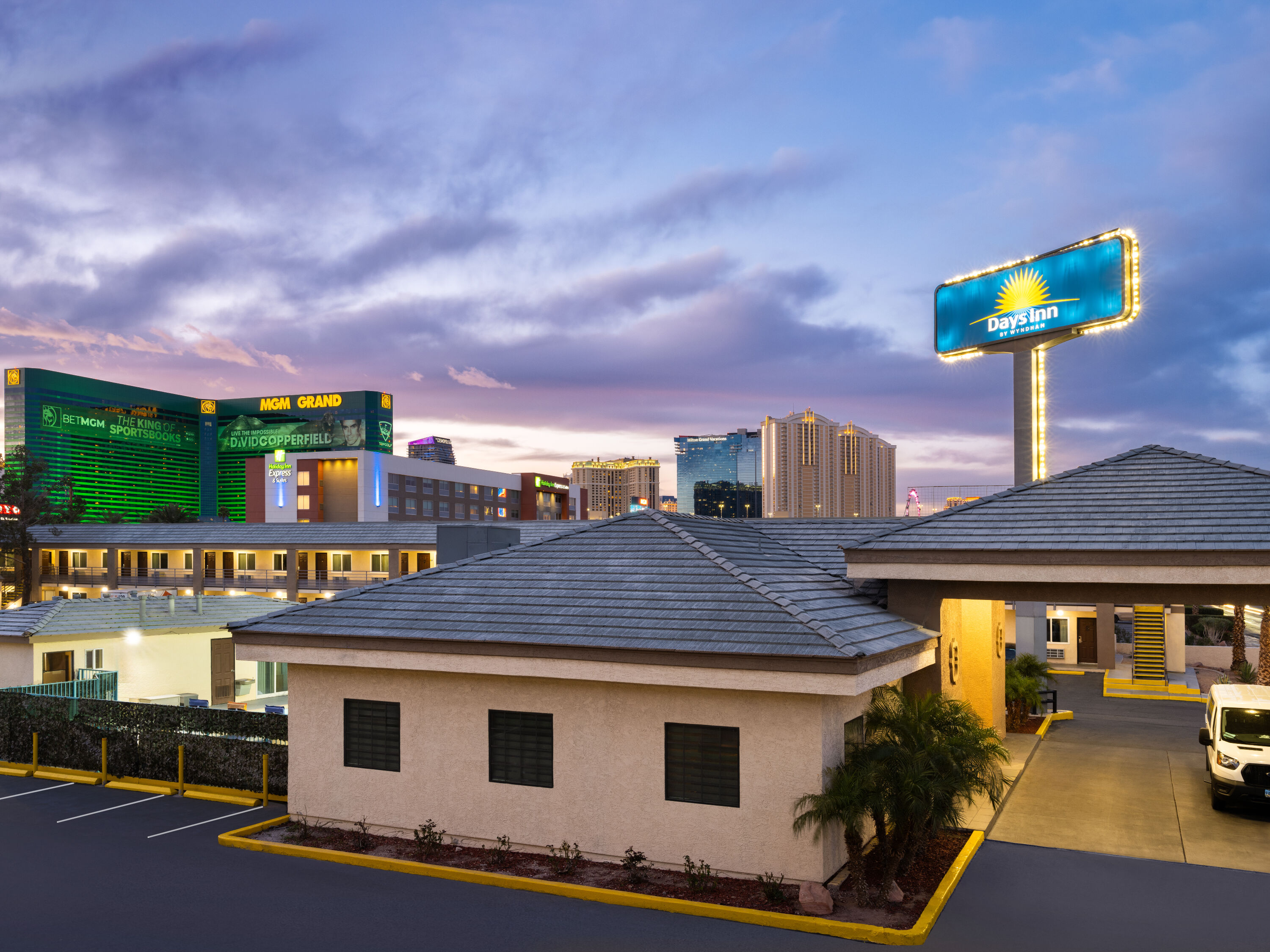 Exterior Dusk Image of Days Inn by Wyndham Las Vegas Airport Near the Strip hotel in Las Vegas, Nevada