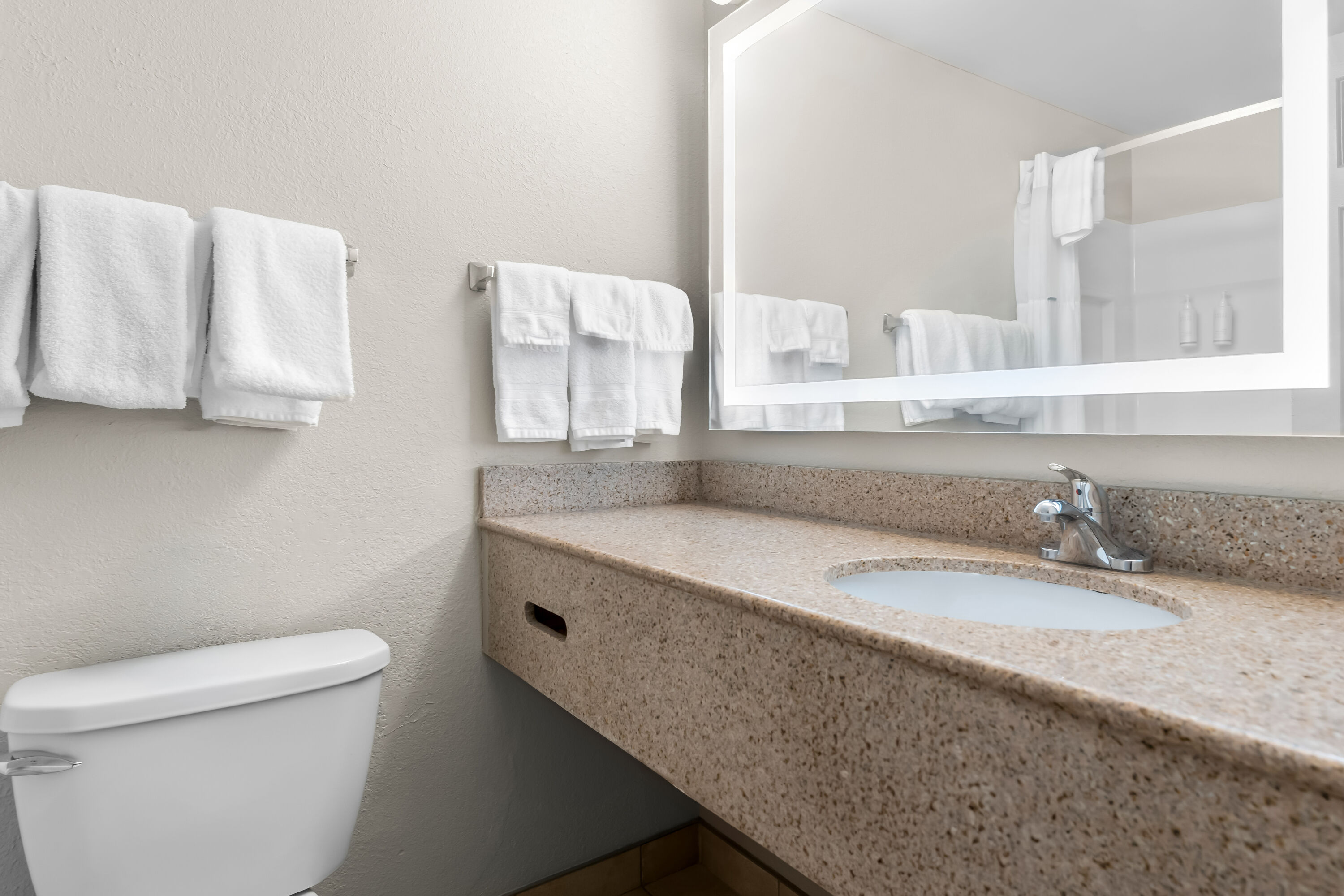 Guest room bath at the Days Inn by Wyndham Albany SUNY in Albany, New York