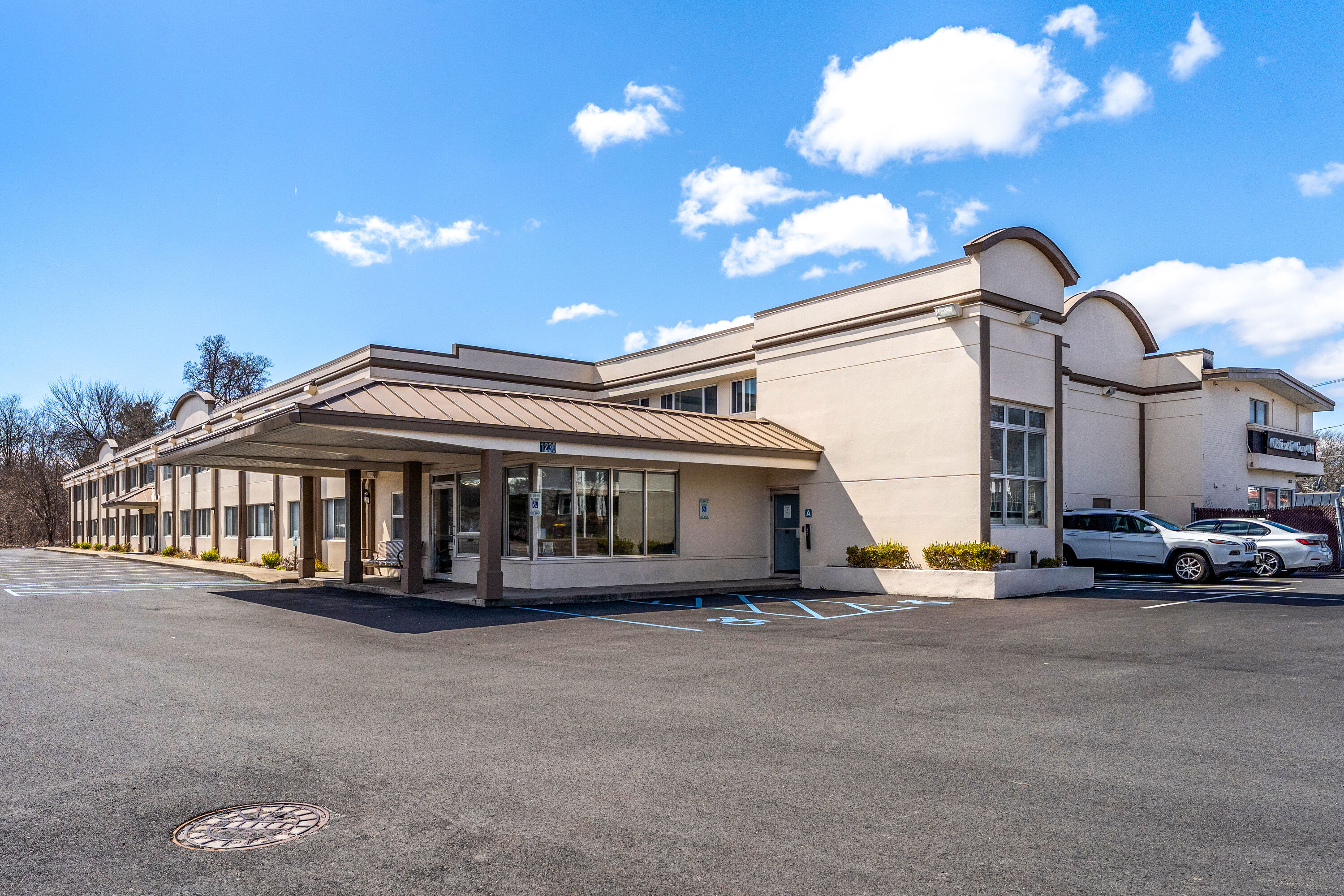 Exterior Day Image of Days Inn by Wyndham Albany SUNY hotel in Albany, New York