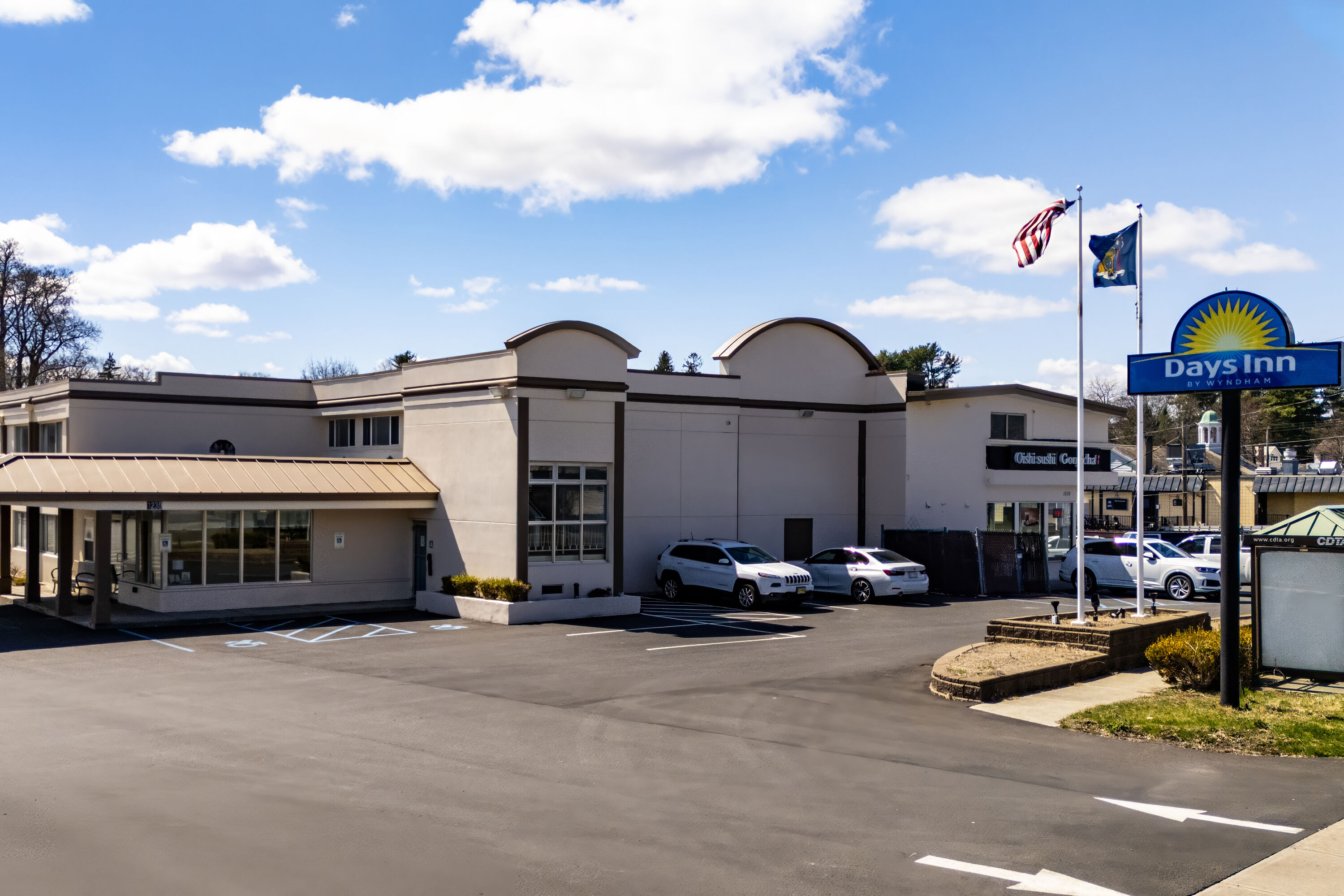 Exterior Day Image of Days Inn by Wyndham Albany SUNY hotel in Albany, New York