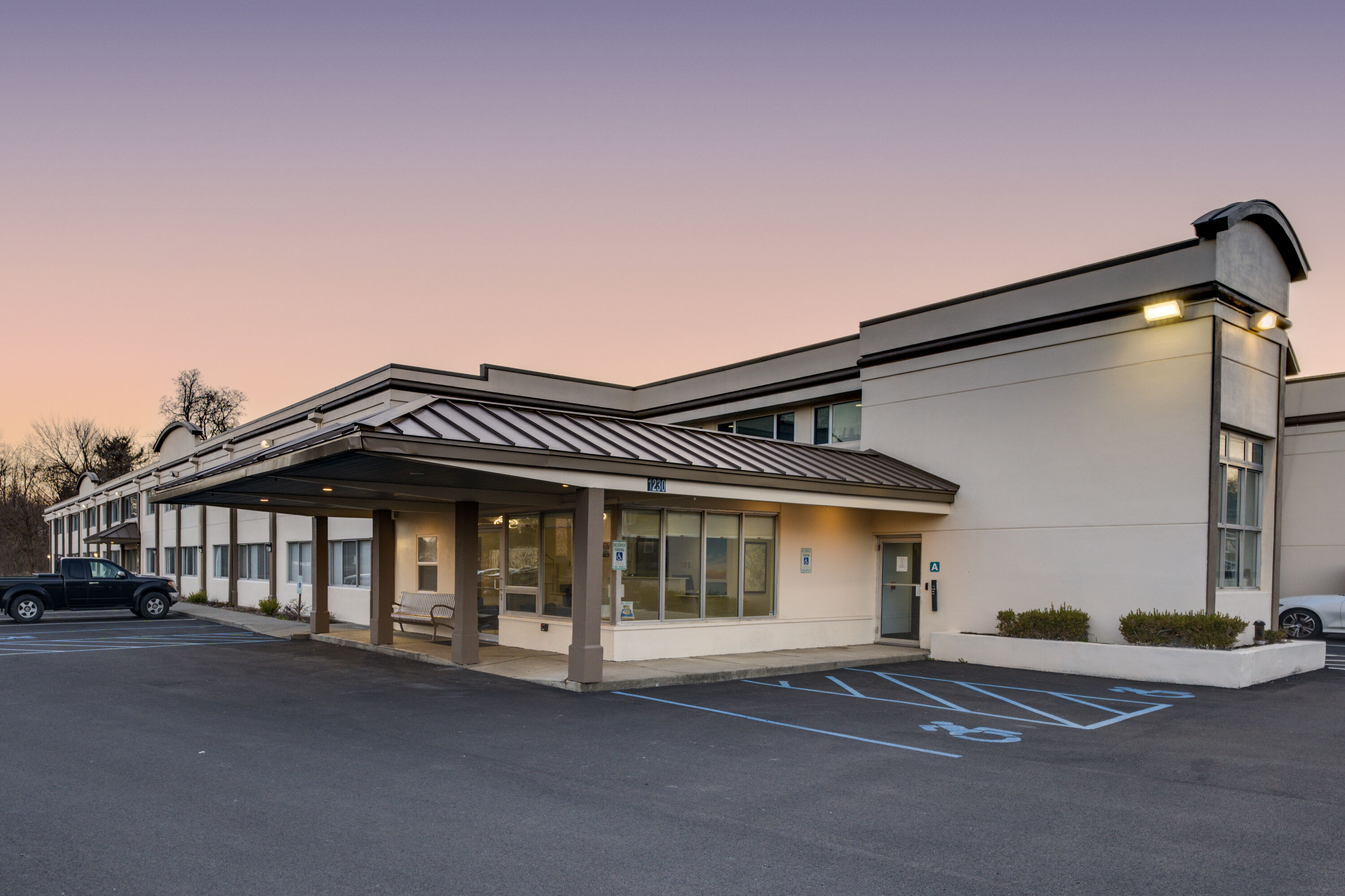 Exterior Night Image of Days Inn by Wyndham Albany SUNY hotel in Albany, New York