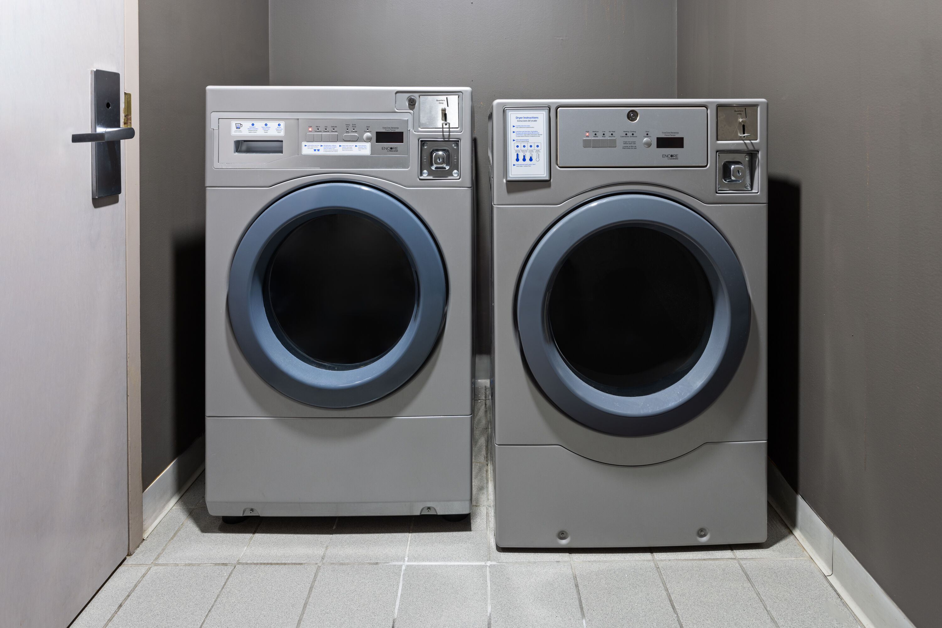 Laundry facilities at Days Inn & Suites by Wyndham Albany in Albany, New York