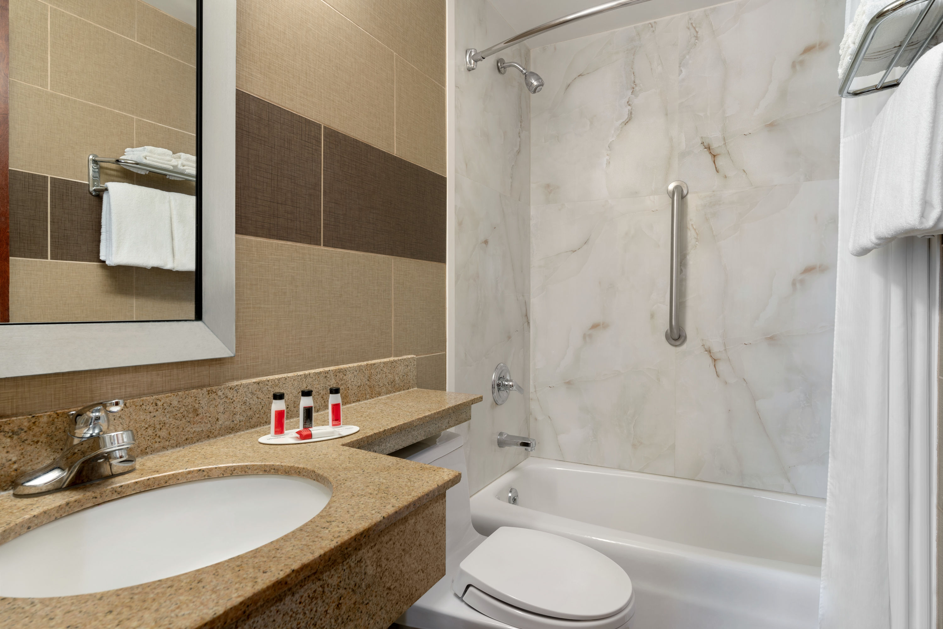 Guest room bath at the Days Inn by Wyndham Brooklyn in Brooklyn, New York