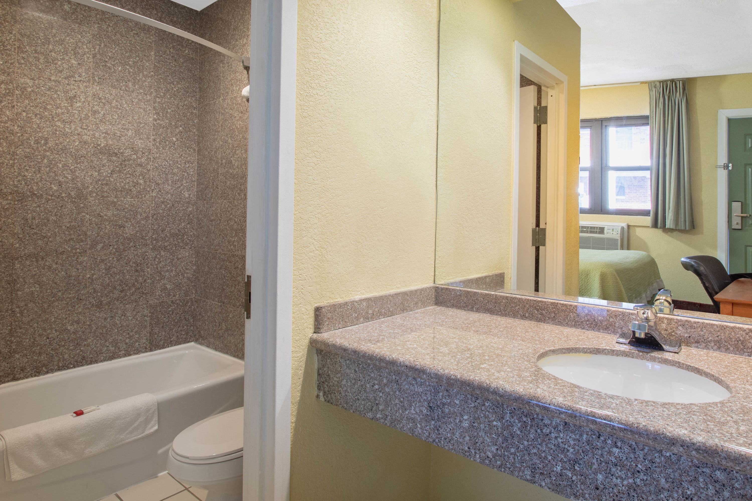 Guest room bath at the Days Inn by Wyndham Elmsford / White Plains in Elmsford, New York