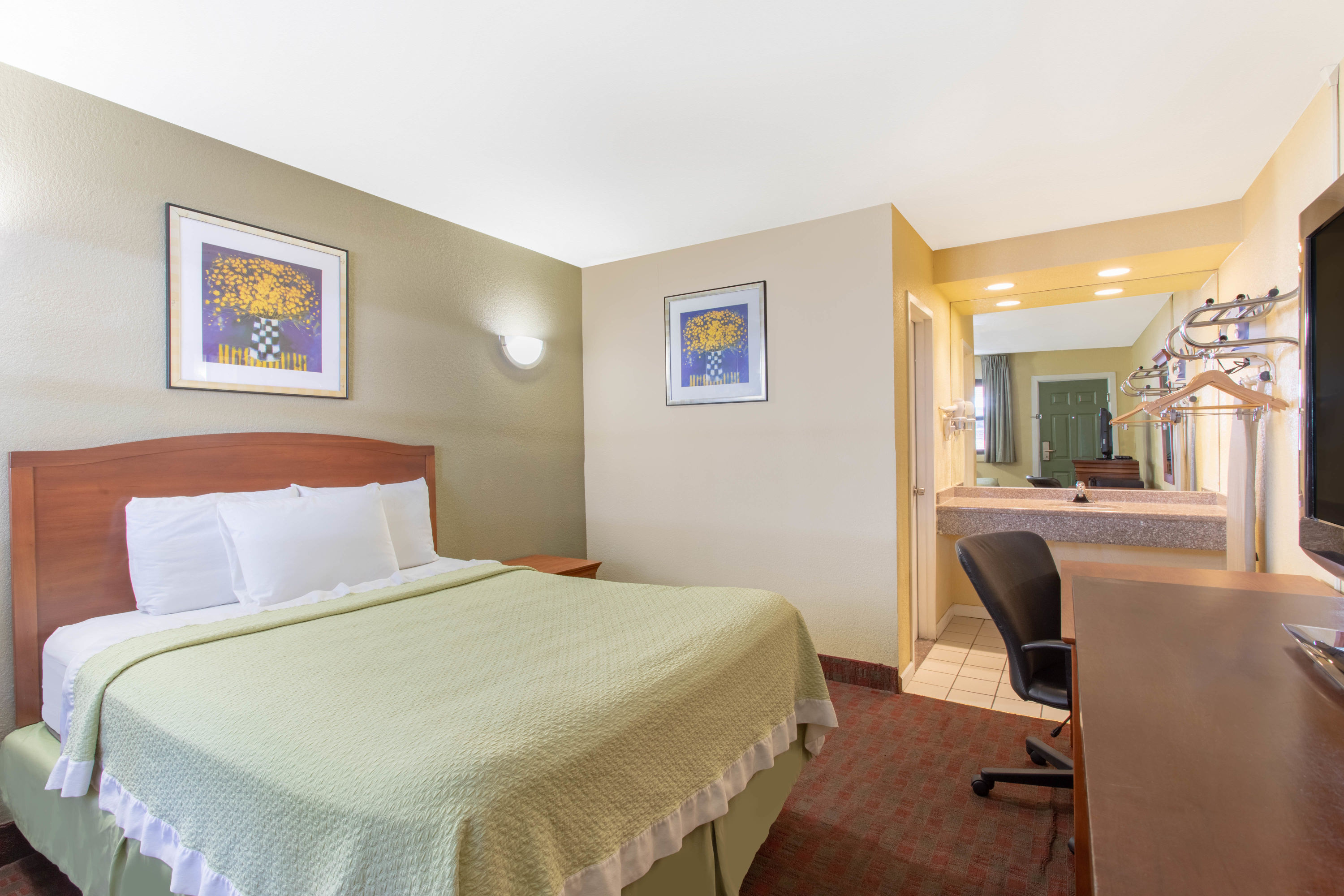 Guest room at the Days Inn by Wyndham Elmsford / White Plains in Elmsford, New York