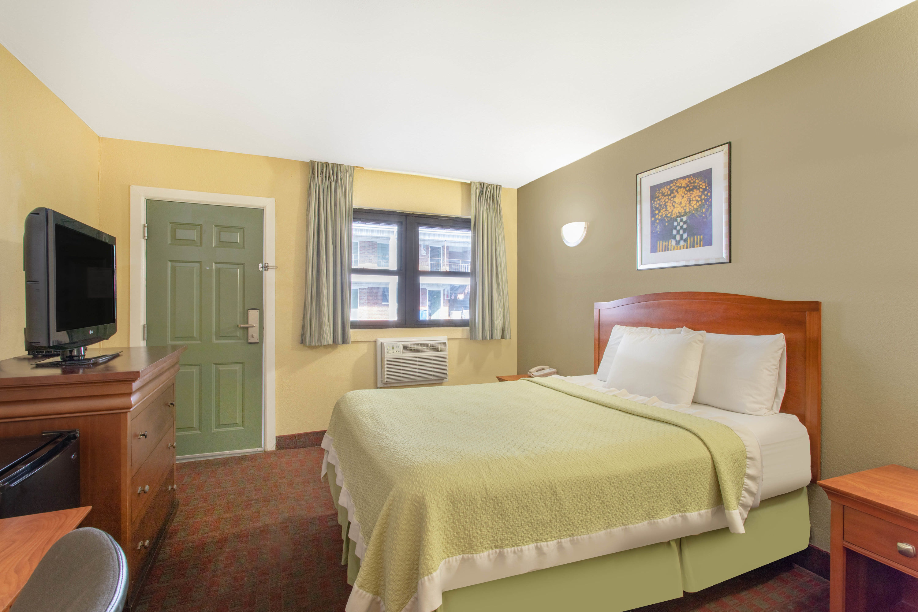 Guest room at the Days Inn by Wyndham Elmsford / White Plains in Elmsford, New York