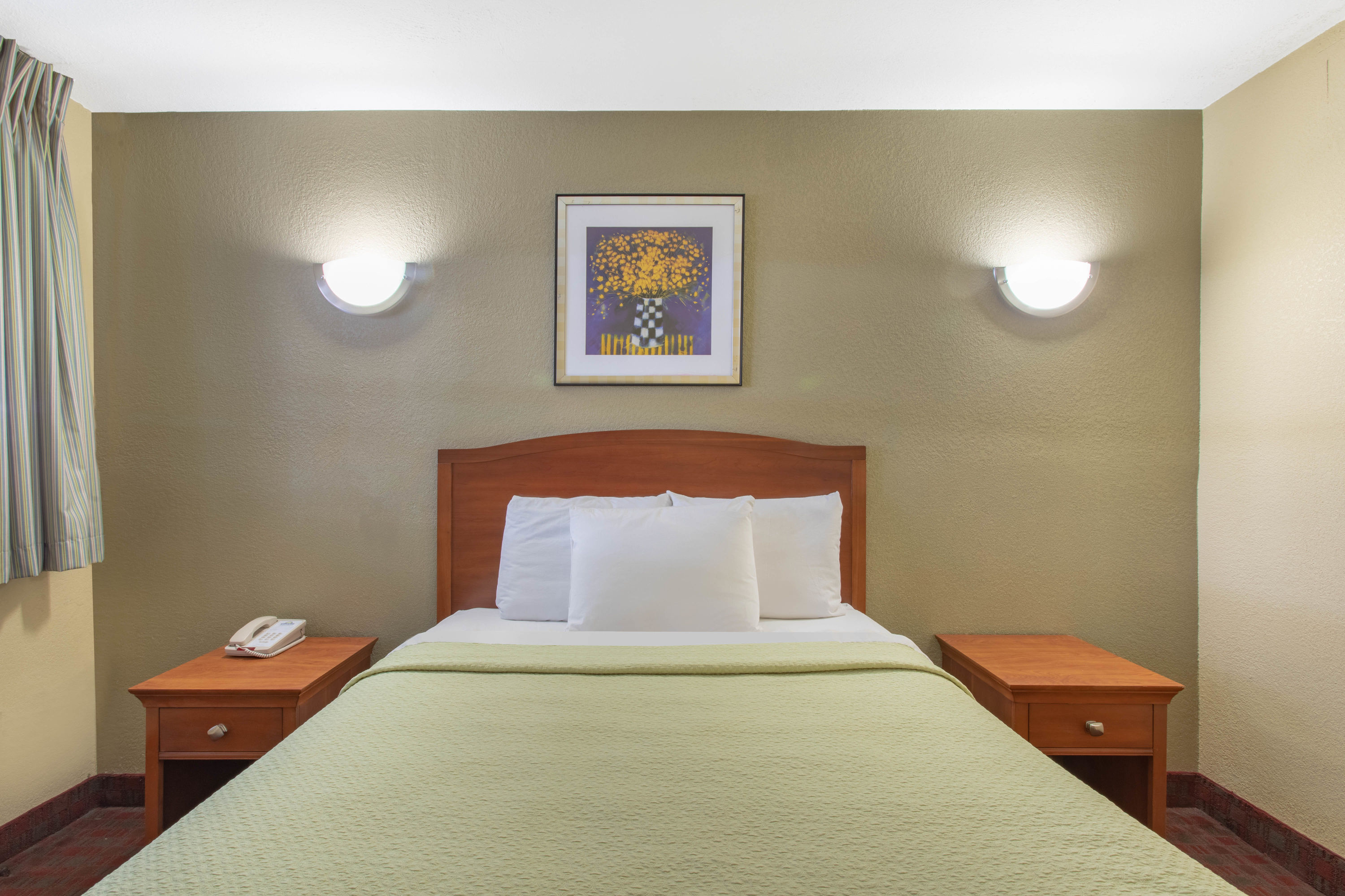 Guest room at the Days Inn by Wyndham Elmsford / White Plains in Elmsford, New York