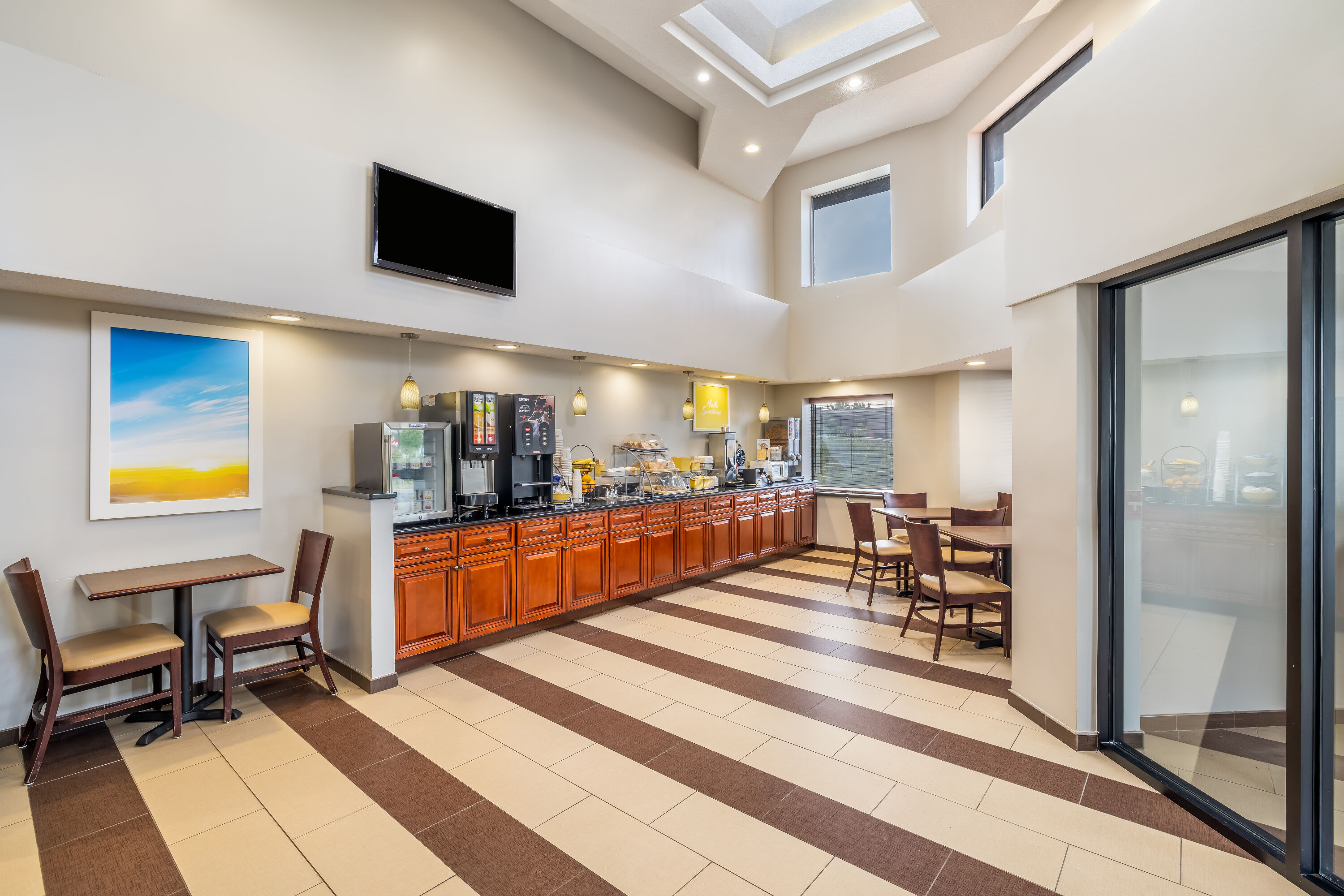 Days Inn by Wyndham Geneva/Finger Lakes restaurant breakfast area with seating in Geneva, New York