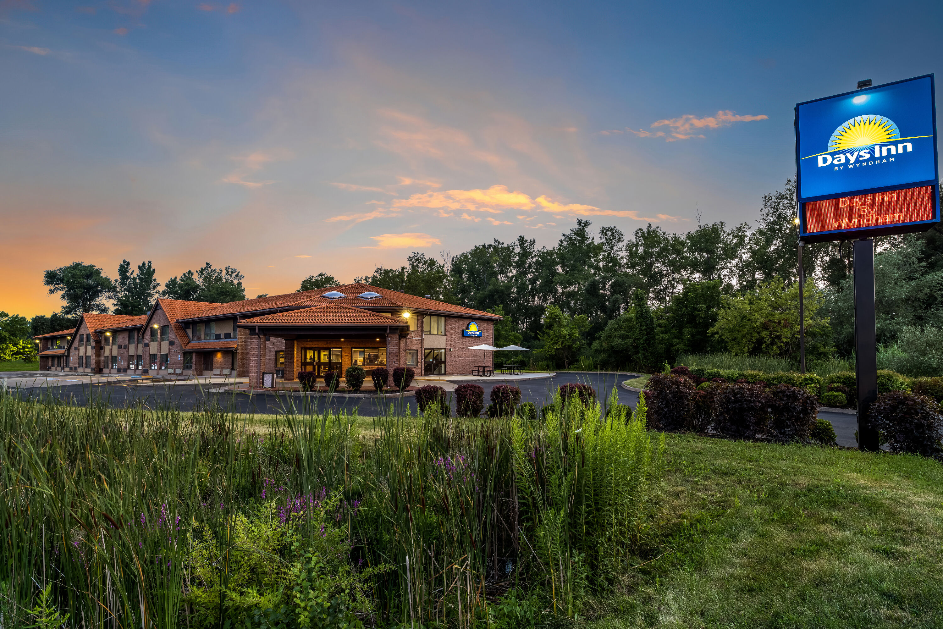 Exterior Dusk Image of Days Inn by Wyndham Geneva/Finger Lakes hotel in Geneva, New York