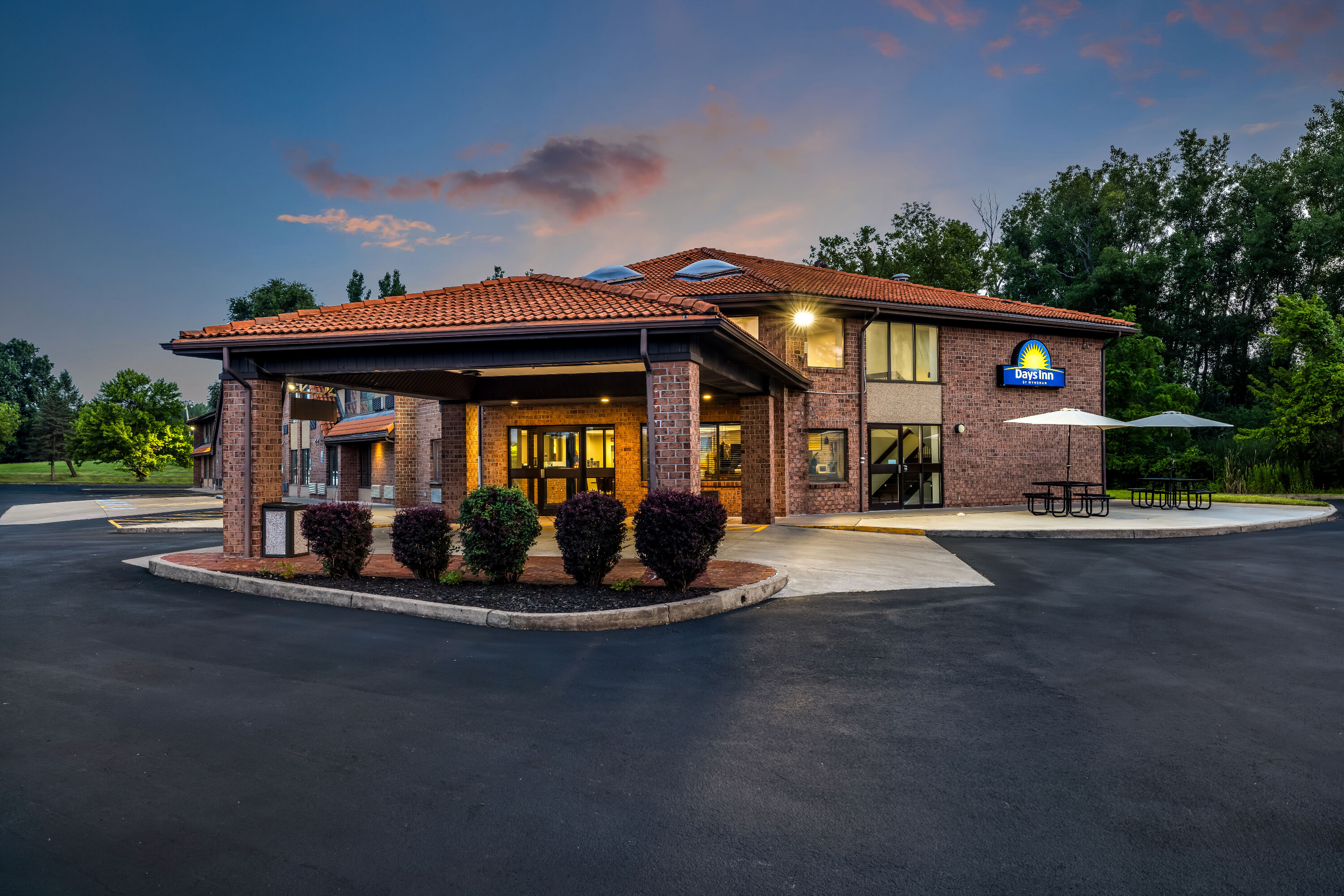 Exterior Dusk Image of Days Inn by Wyndham Geneva/Finger Lakes hotel in Geneva, New York