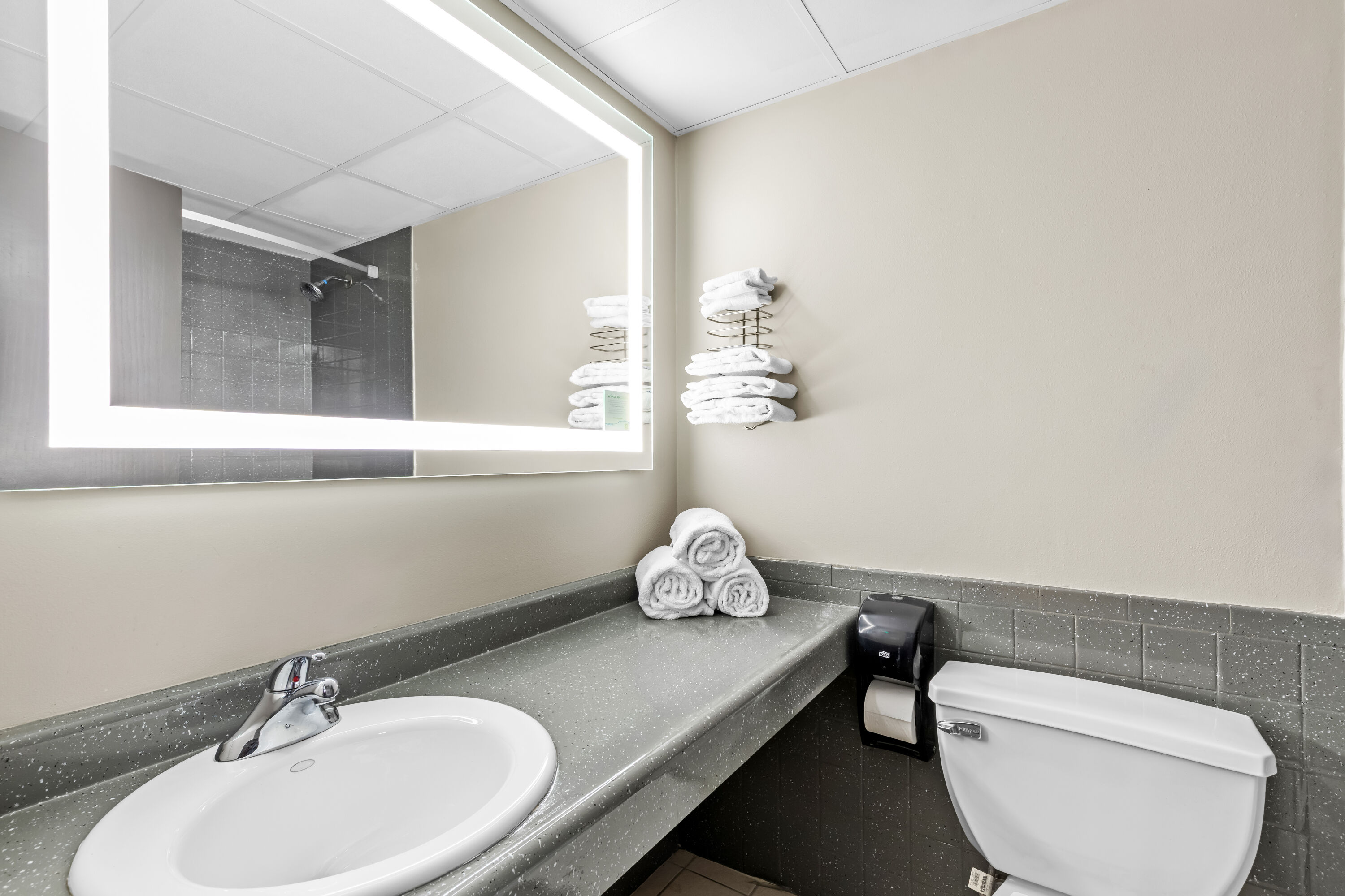Guest room bath at the Days Inn by Wyndham Liberty in Liberty, New York