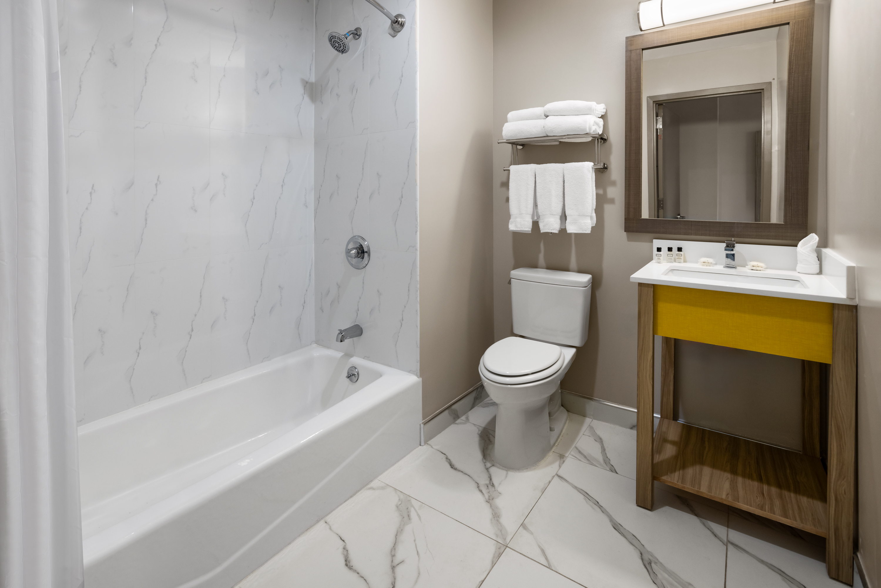 Guest room bath at the Days Inn by Wyndham Staten Island in Staten Island, New York