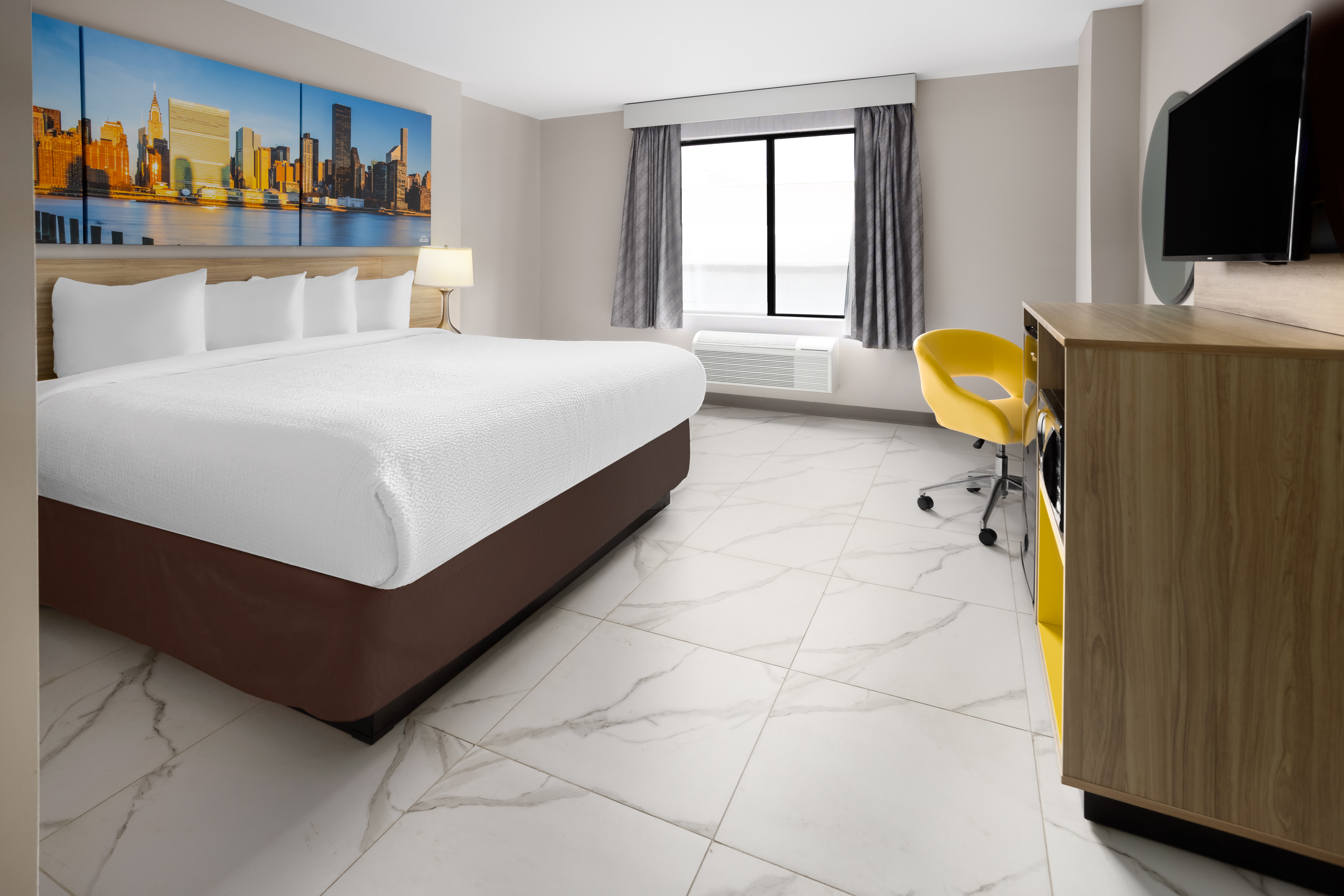 Guest room at the Days Inn by Wyndham Staten Island in Staten Island, New York