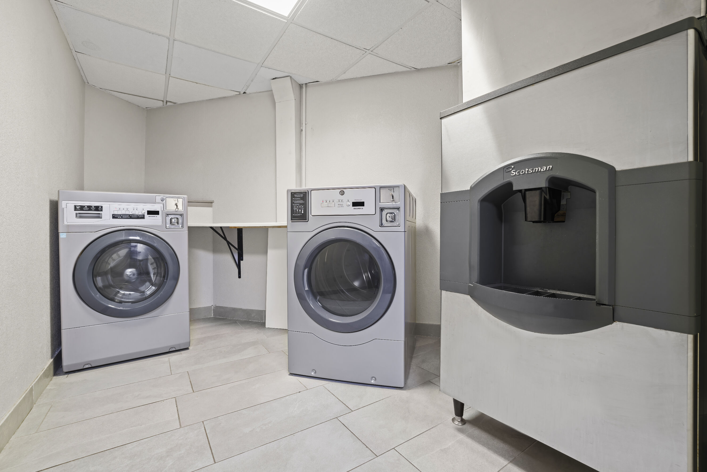 Laundry facilities at Days Inn by Wyndham Utica in Utica, New York