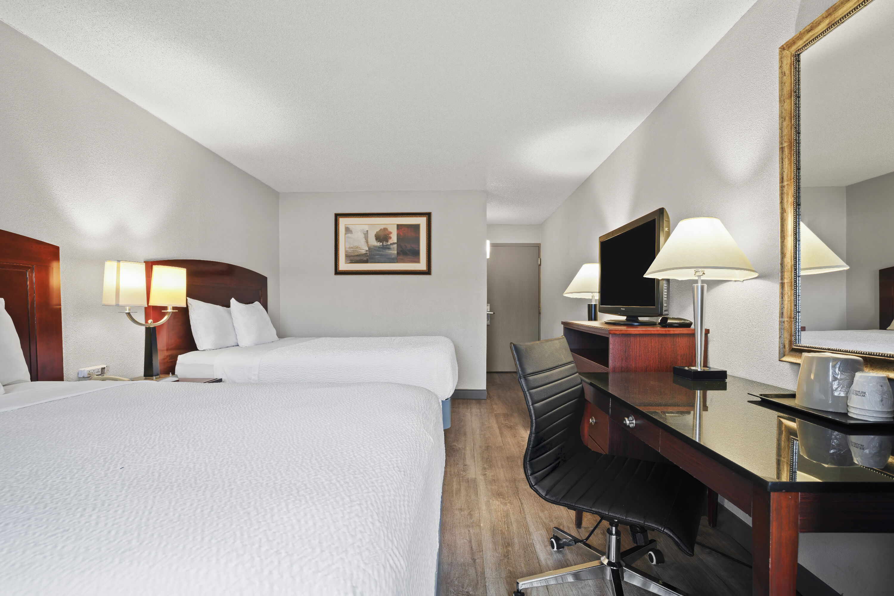 Double bed guest room at the Days Inn by Wyndham Utica in Utica, New York