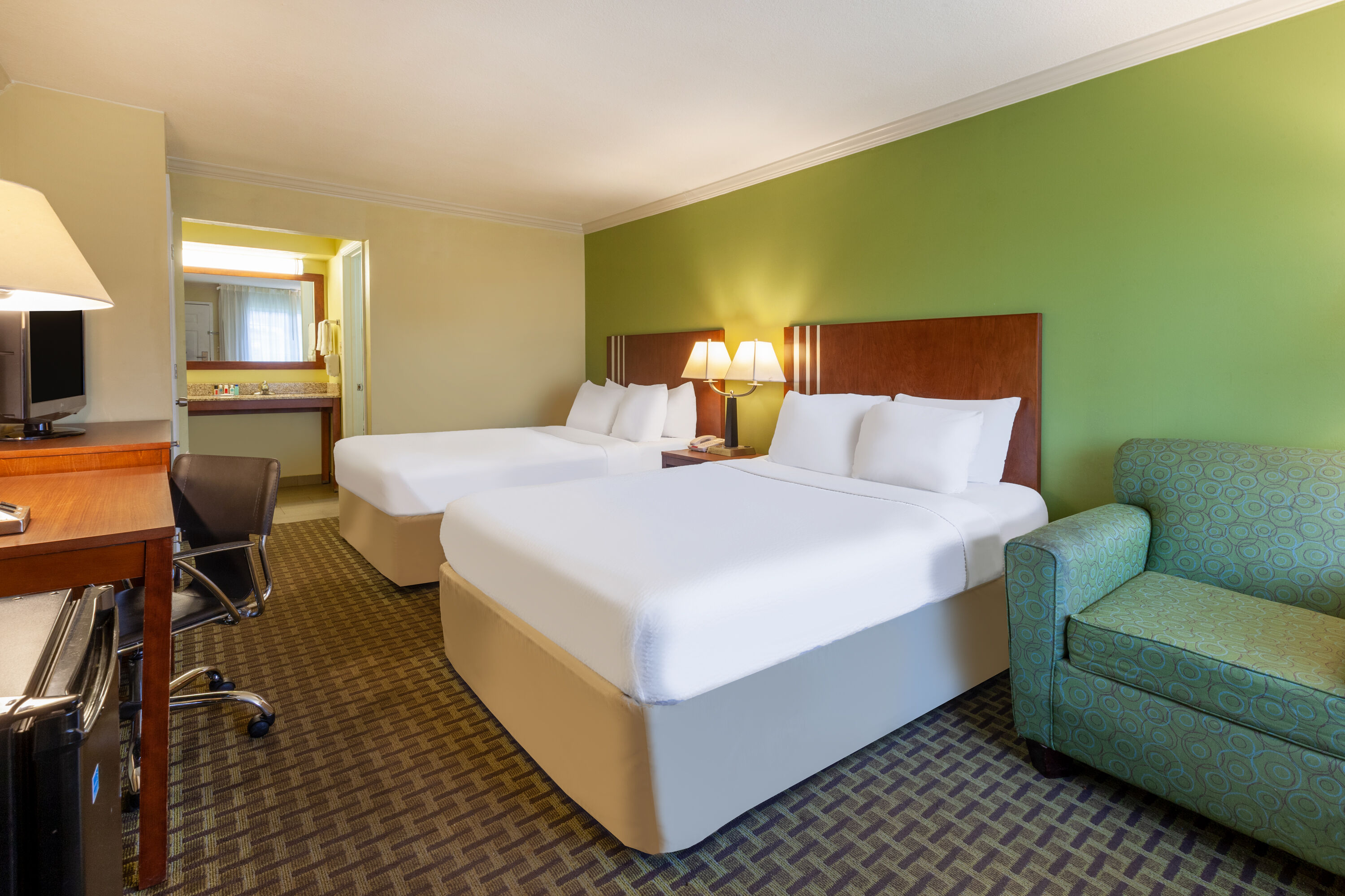 Guest room at the Days Inn by Wyndham Austintown in Austintown, Ohio