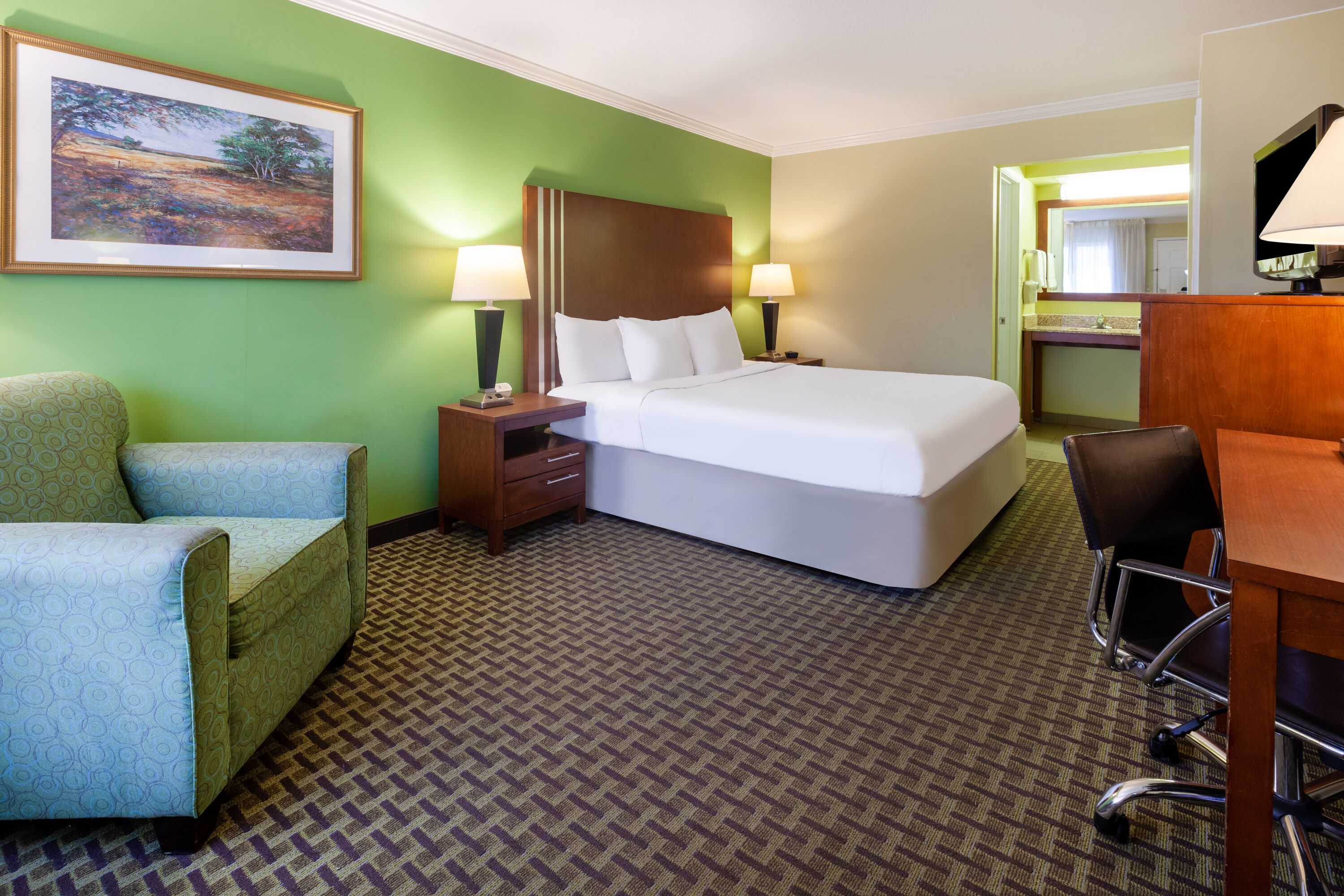 Guest room at the Days Inn by Wyndham Austintown in Austintown, Ohio