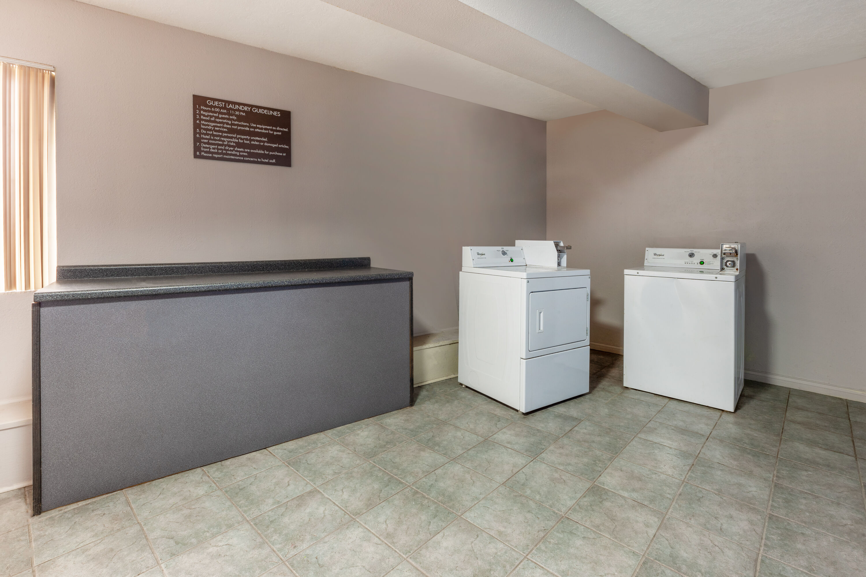 Laundry facilities at Days Inn by Wyndham Austintown in Austintown, Ohio