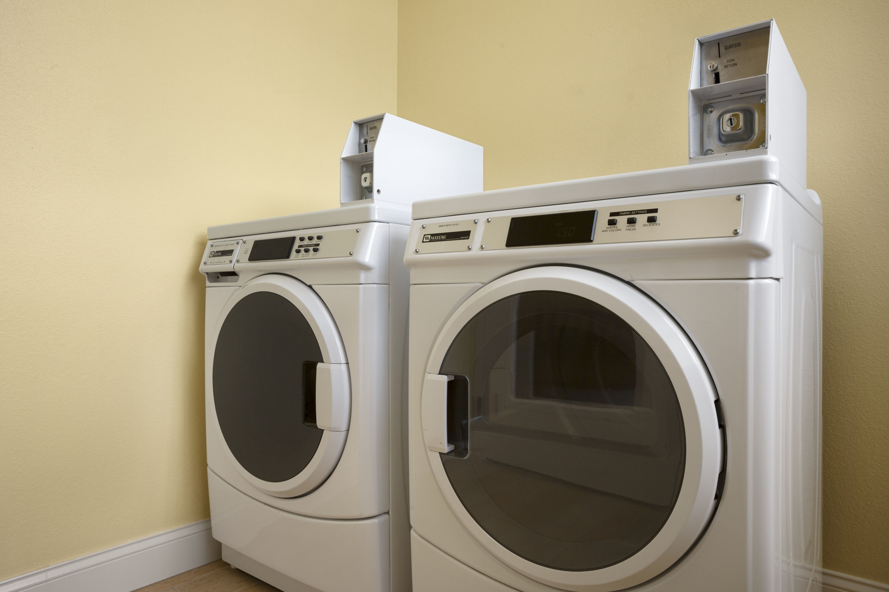 Laundry facilities at Days Inn & Suites by Wyndham Caldwell in Caldwell, Ohio