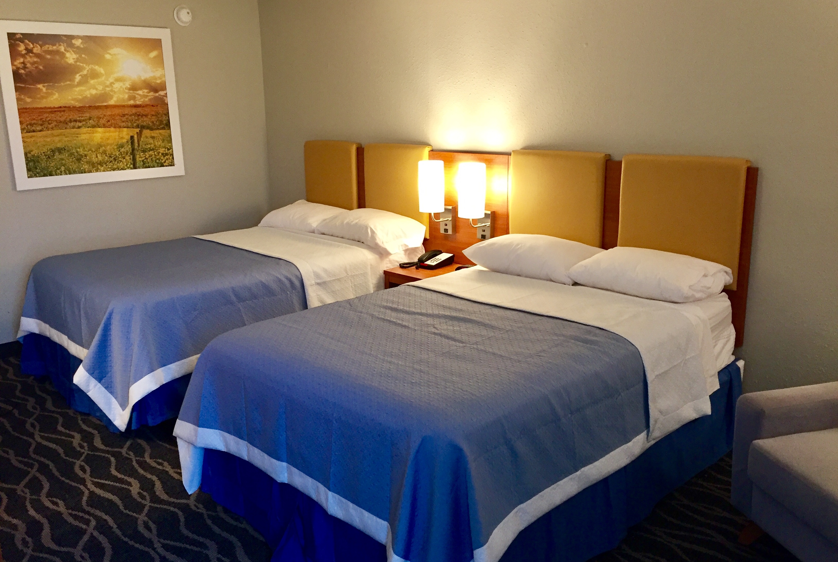 Guest room at the Days Inn & Suites by Wyndham Cincinnati North in Cincinnati, Ohio
