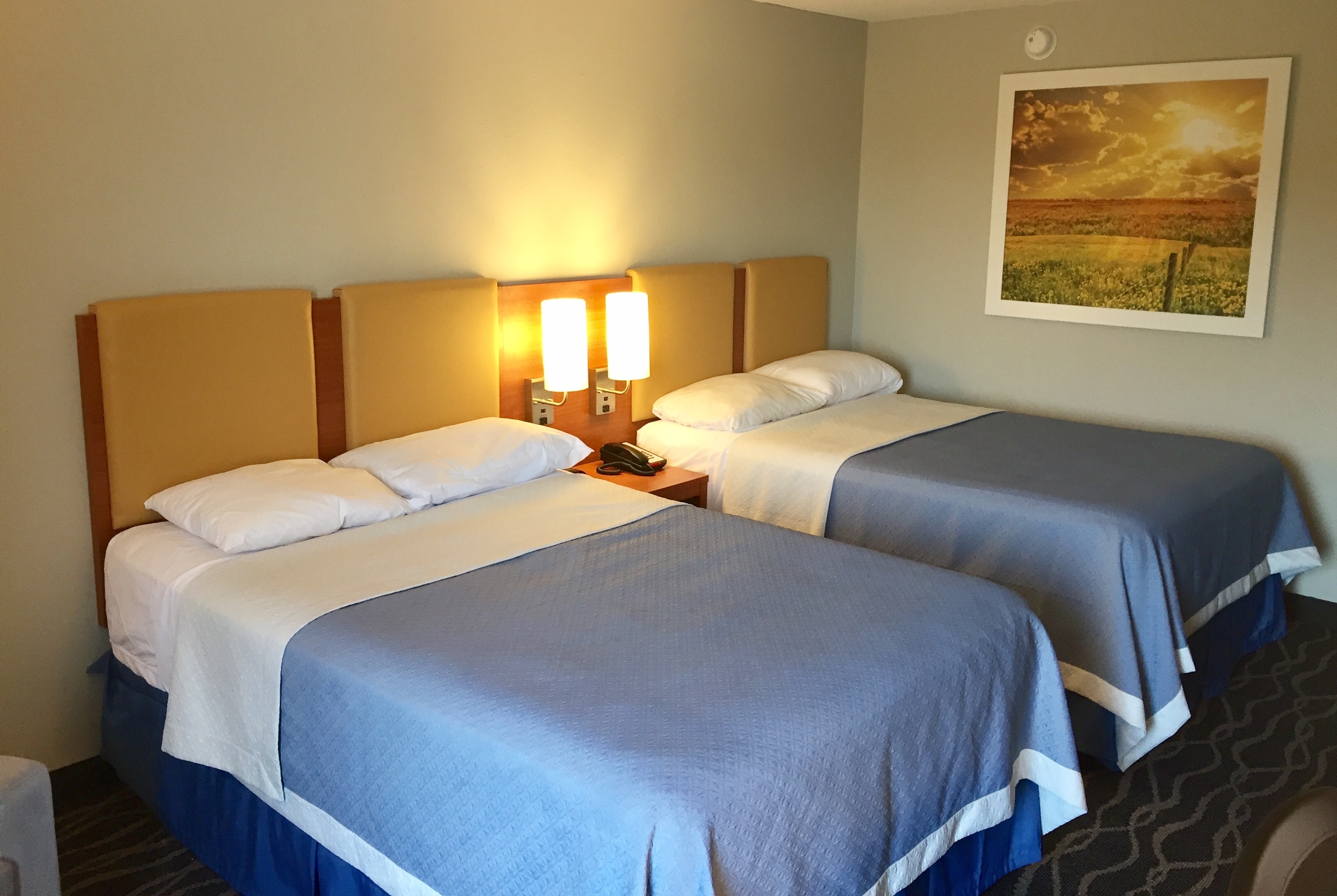 Guest room at the Days Inn & Suites by Wyndham Cincinnati North in Cincinnati, Ohio