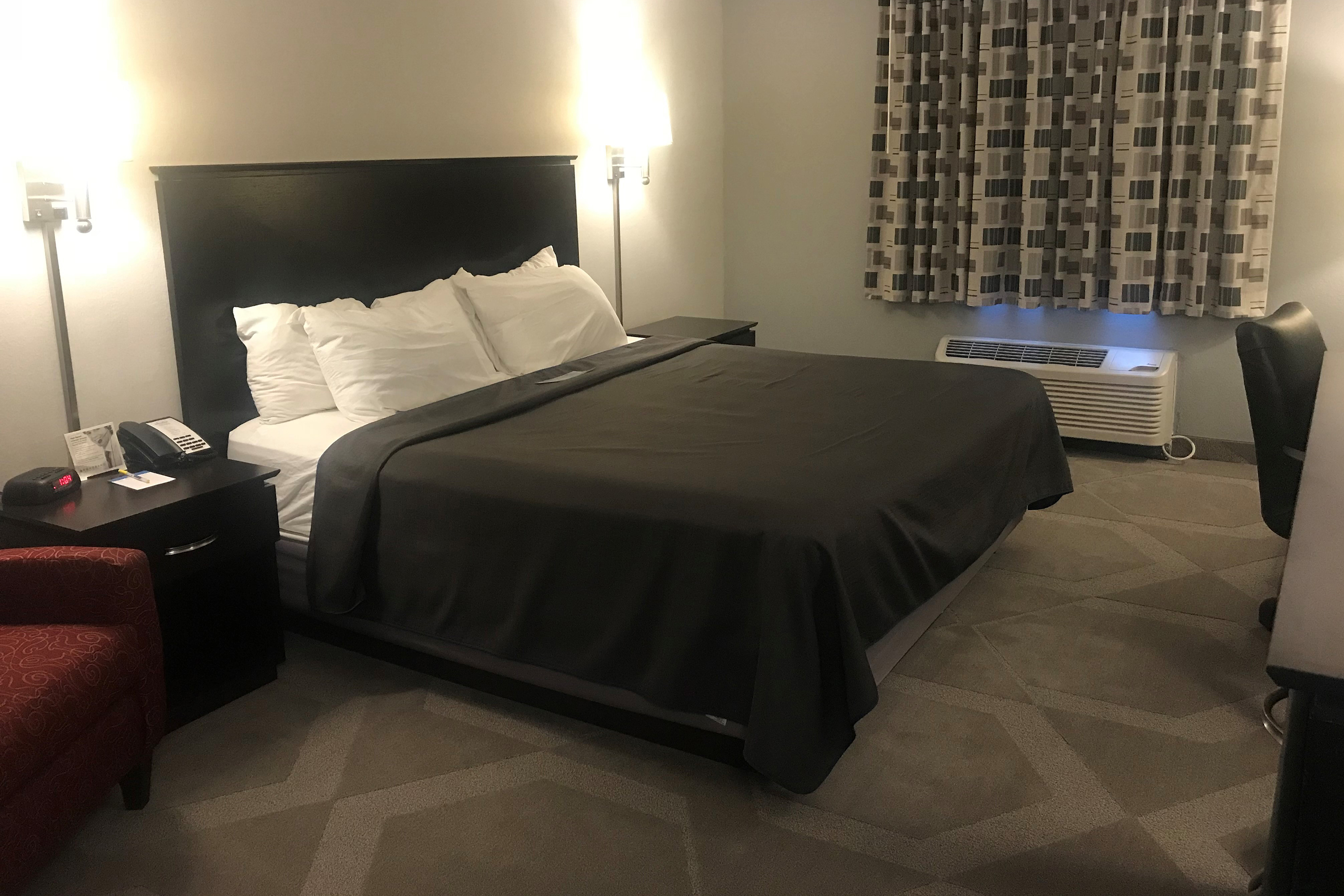 Guest room at the Days Inn by Wyndham Conneaut in Conneaut, Ohio