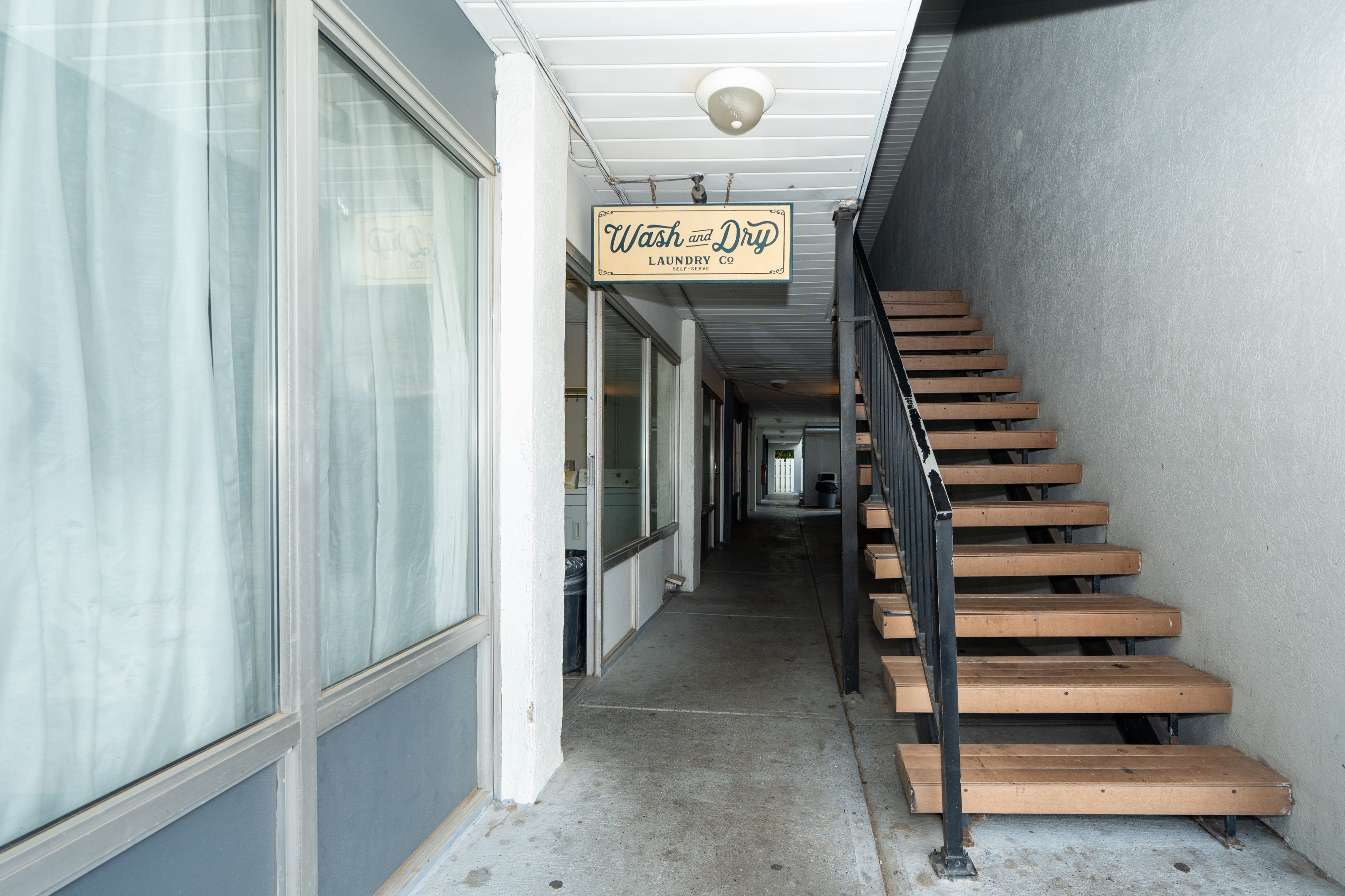 Laundry facilities at Days Inn & Suites by Wyndham Dayton North in Dayton, Ohio